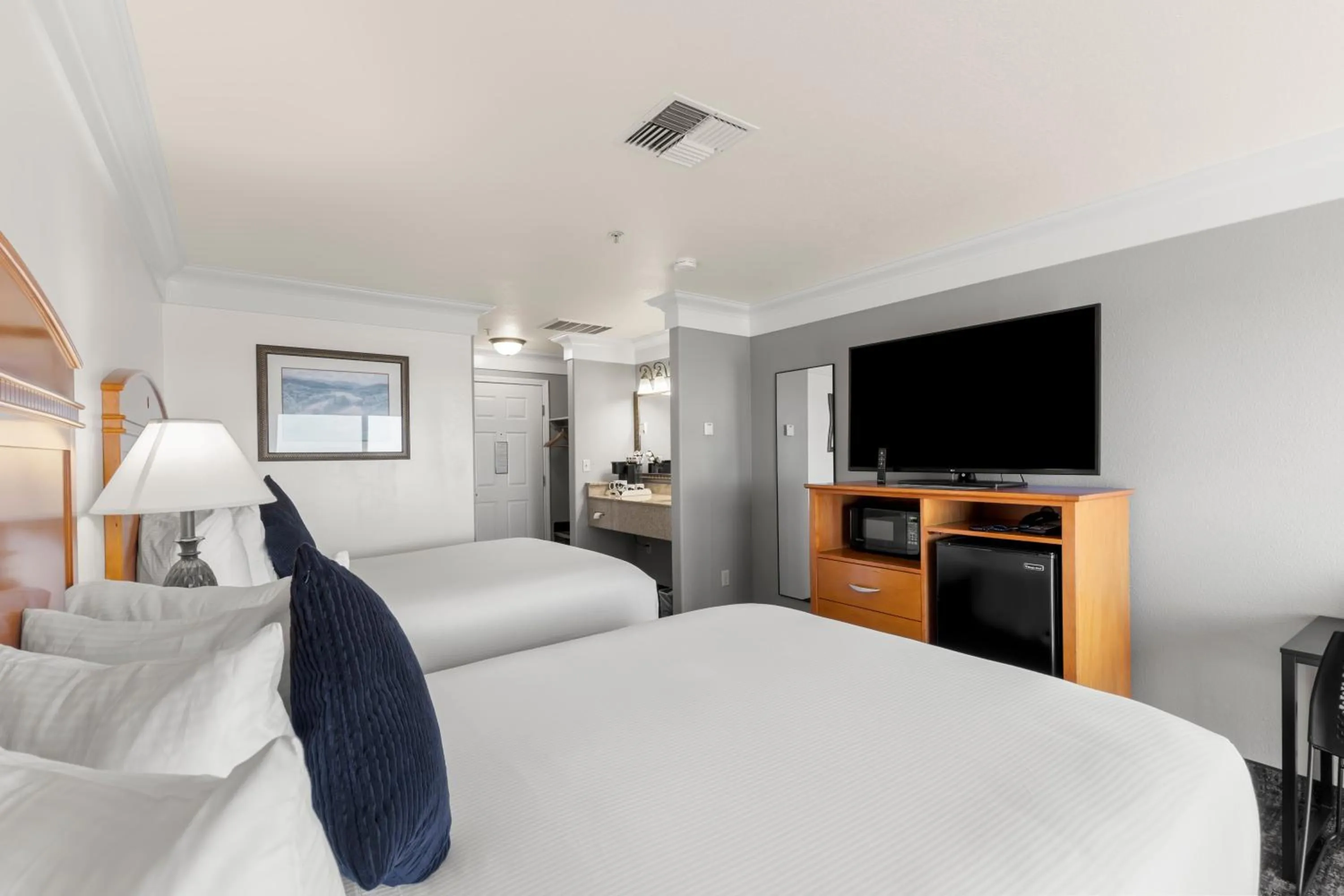 Bed in Beachcomber Motel