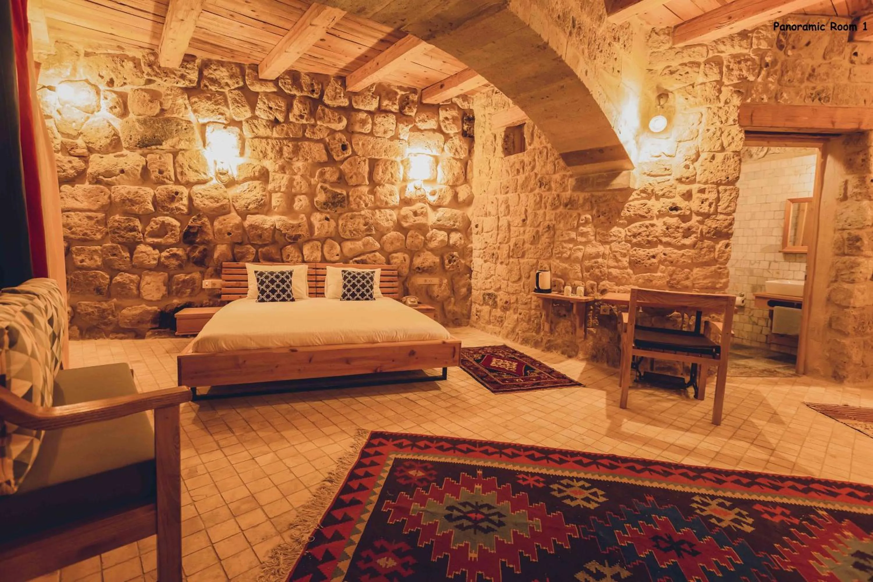 Bed in Pinhan Cave Suites