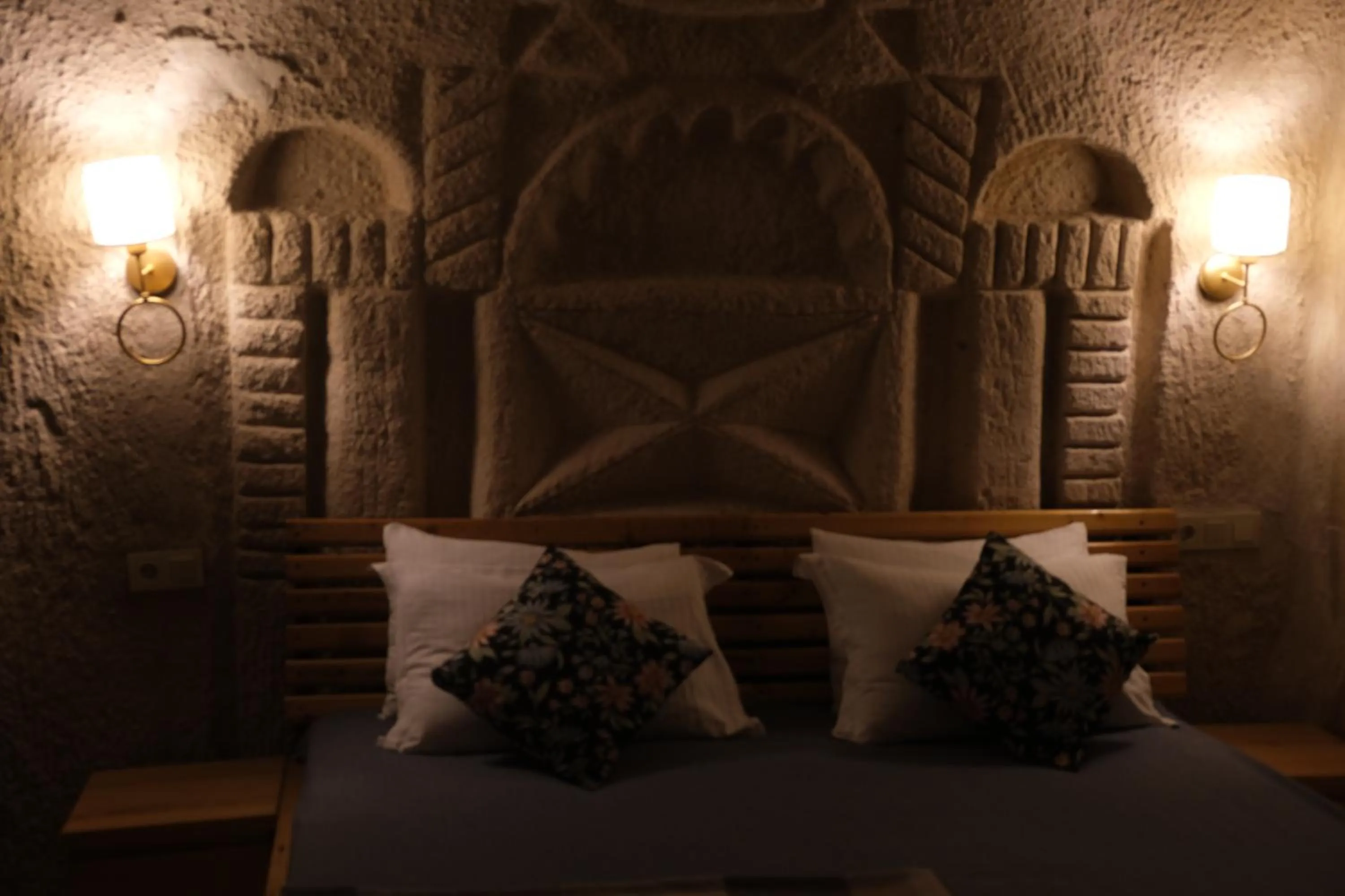 Bed in Pinhan Cave Suites