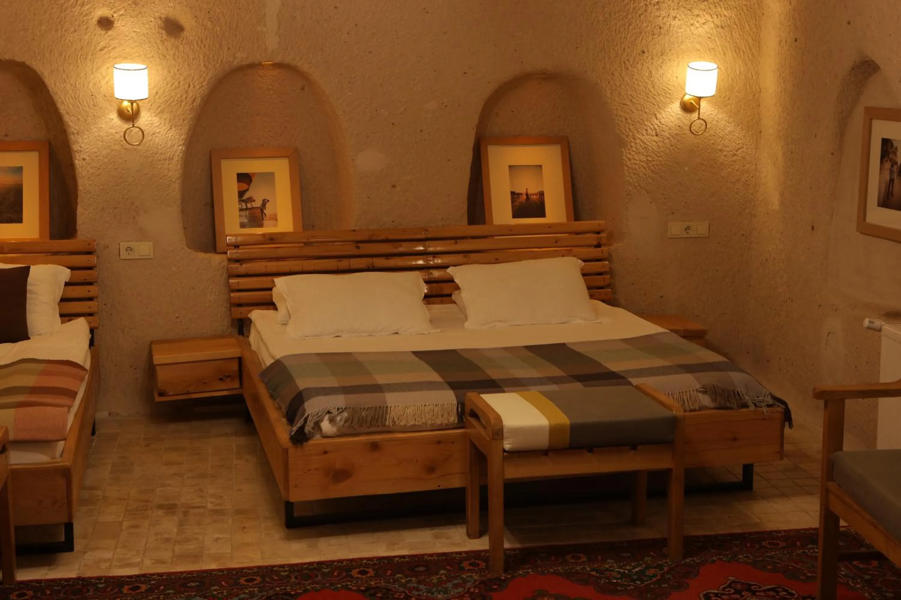 Bed in Pinhan Cave Suites