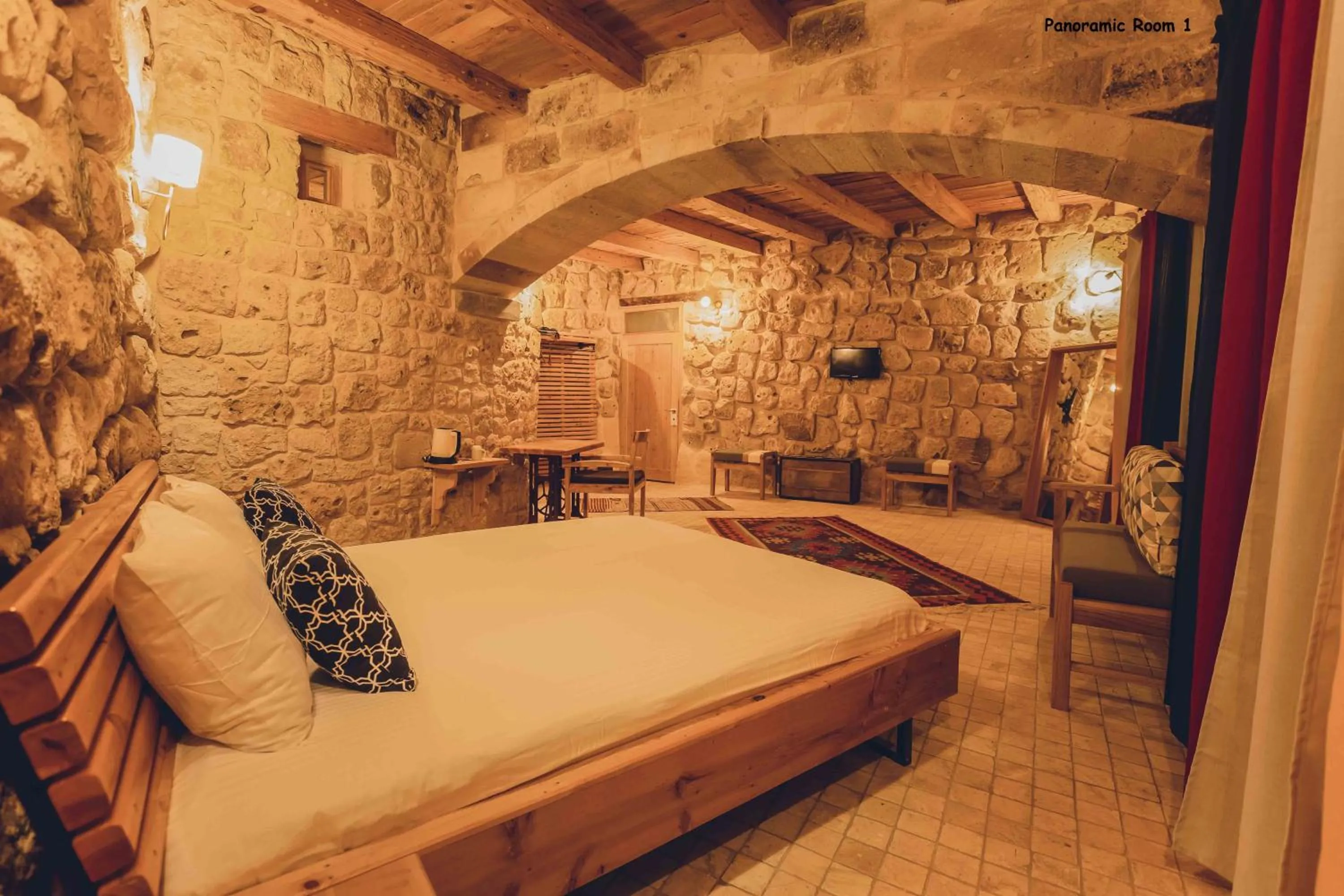 Bed in Pinhan Cave Suites