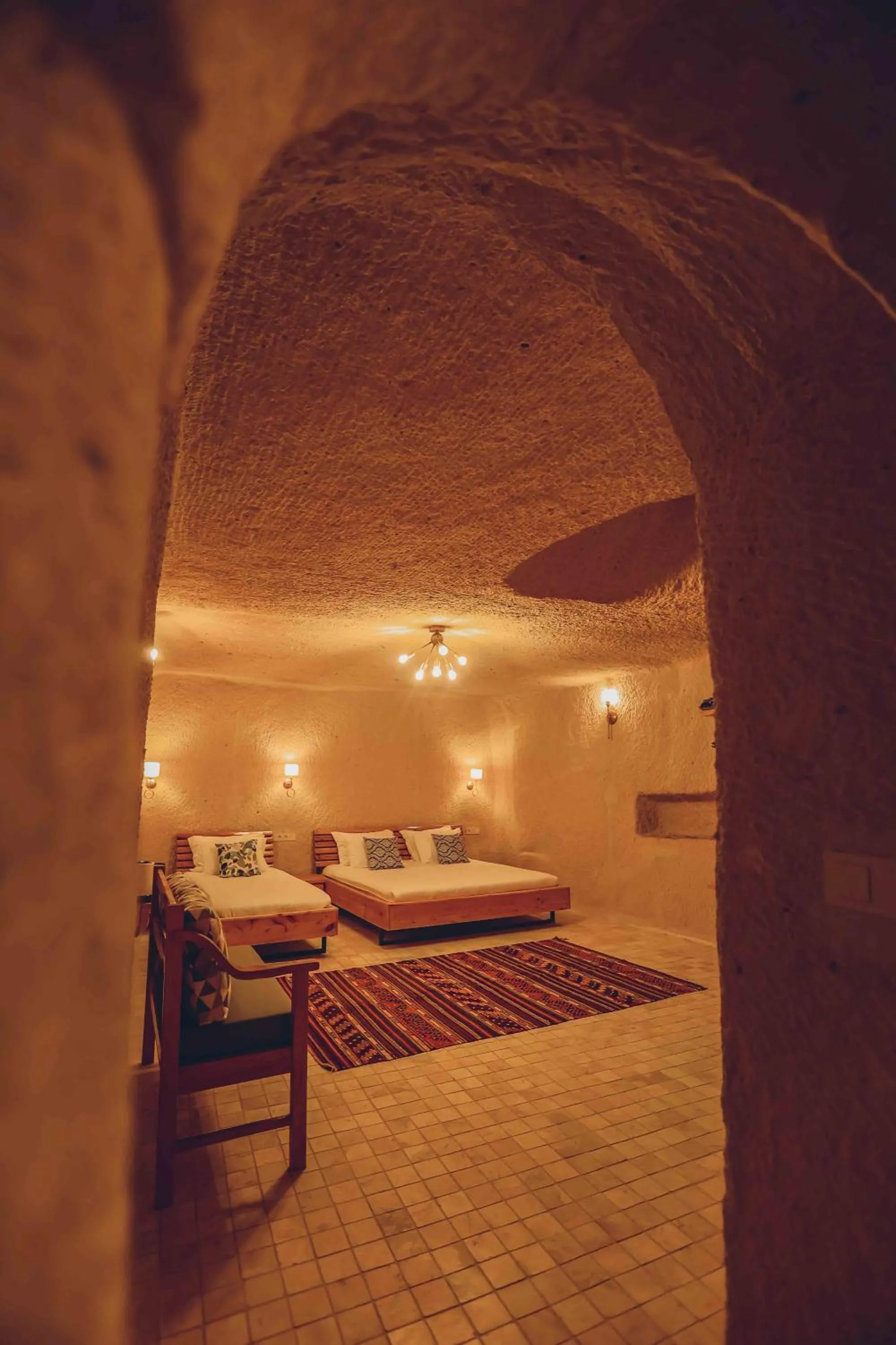 Bed in Pinhan Cave Suites
