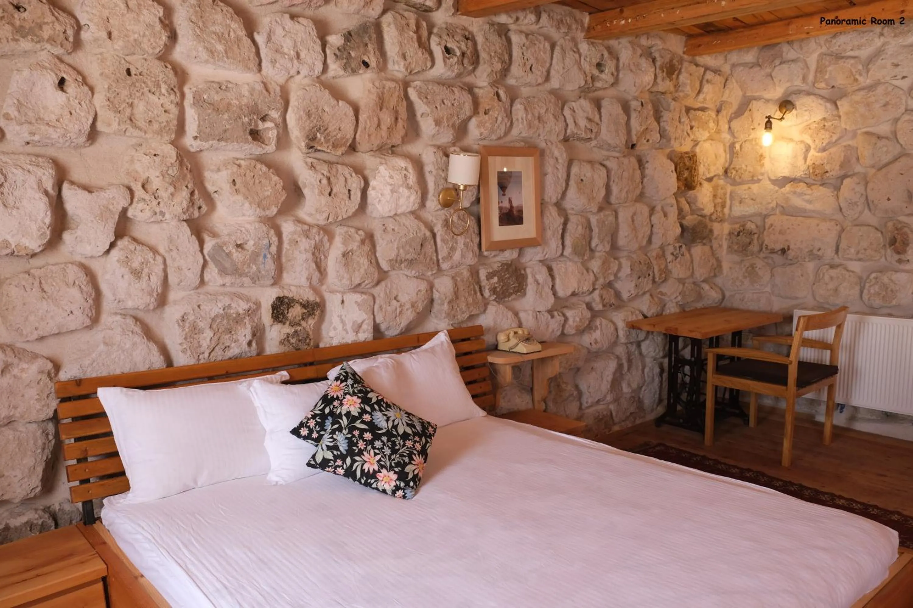 Bed in Pinhan Cave Suites