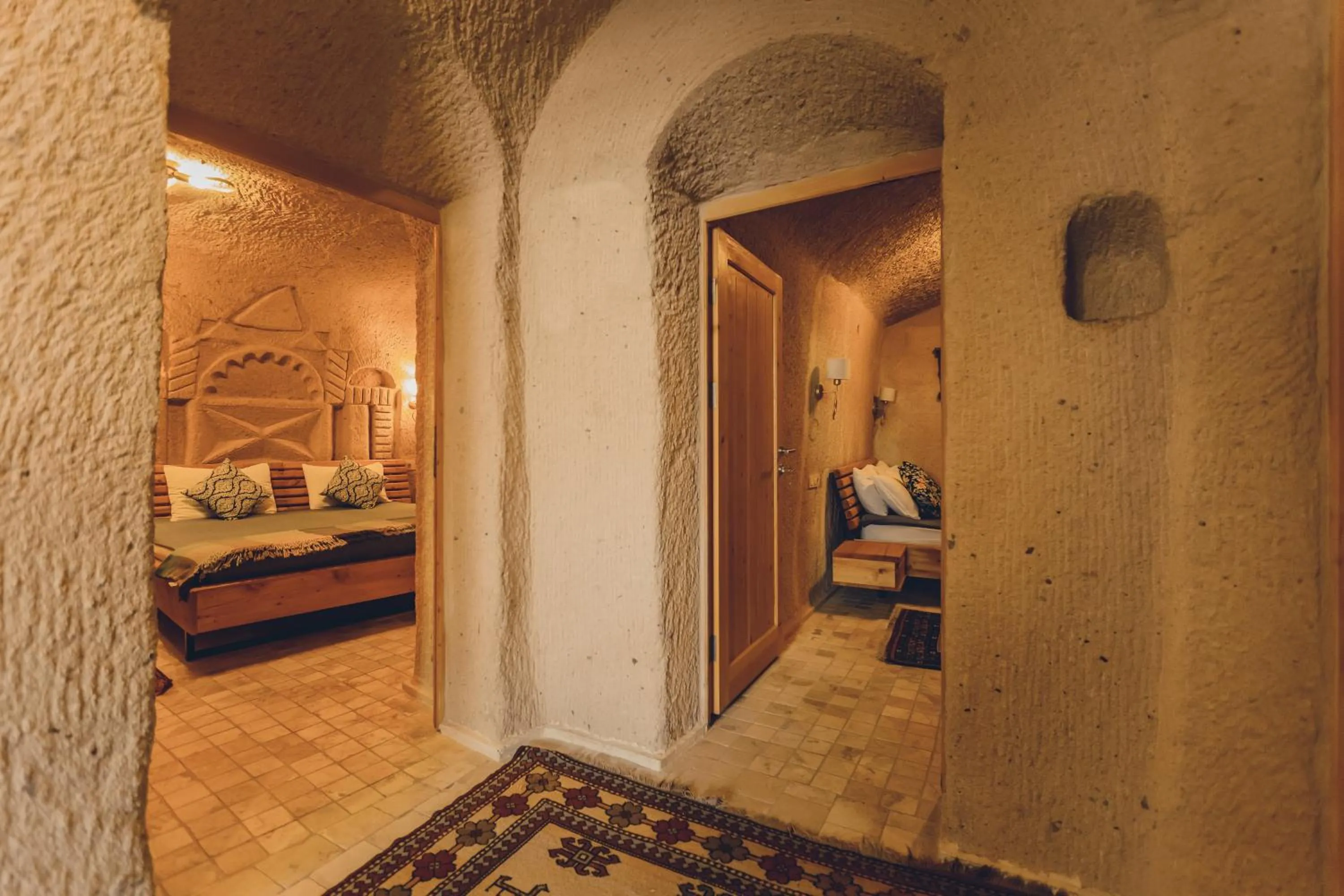 Bed in Pinhan Cave Suites