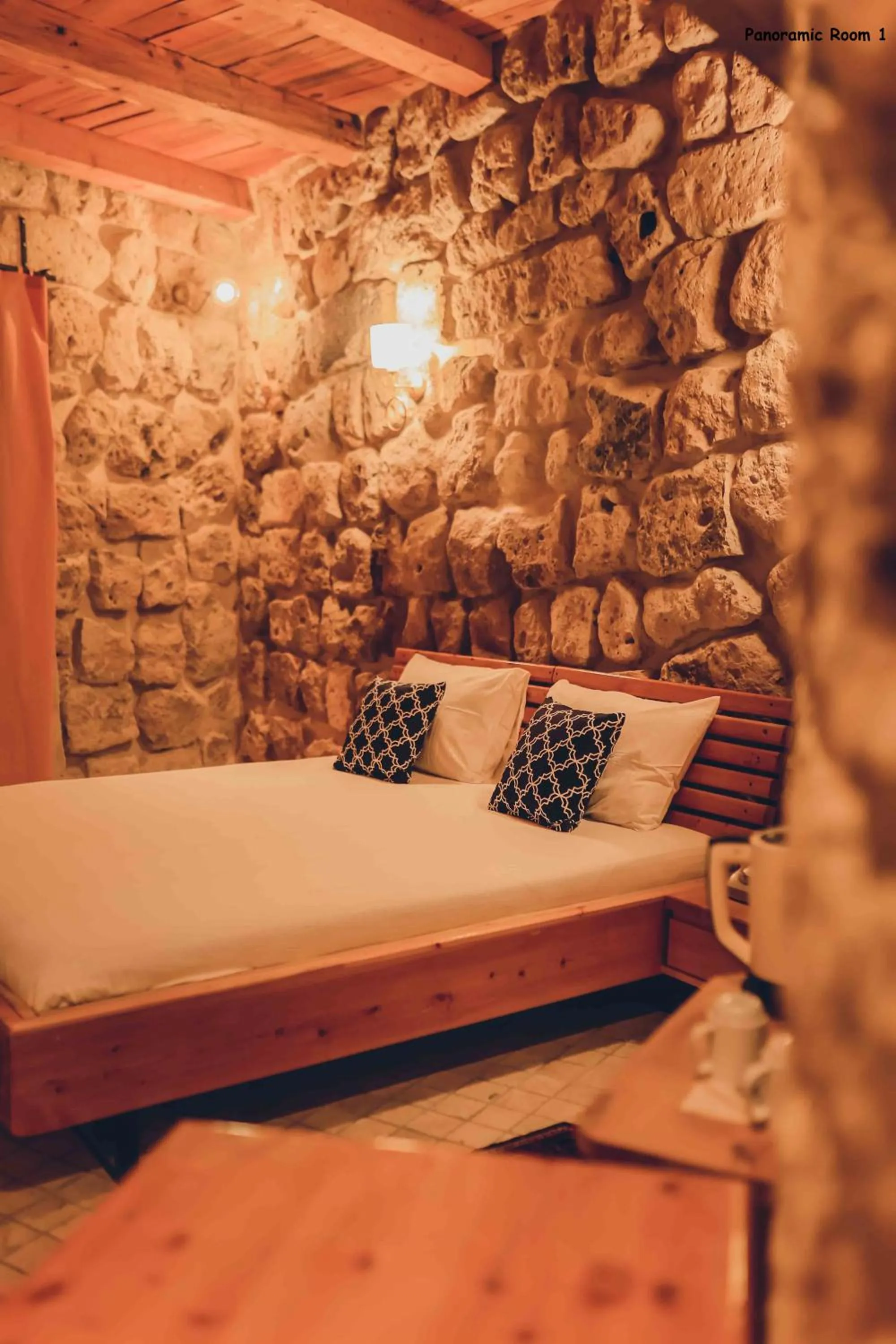 Bed in Pinhan Cave Suites