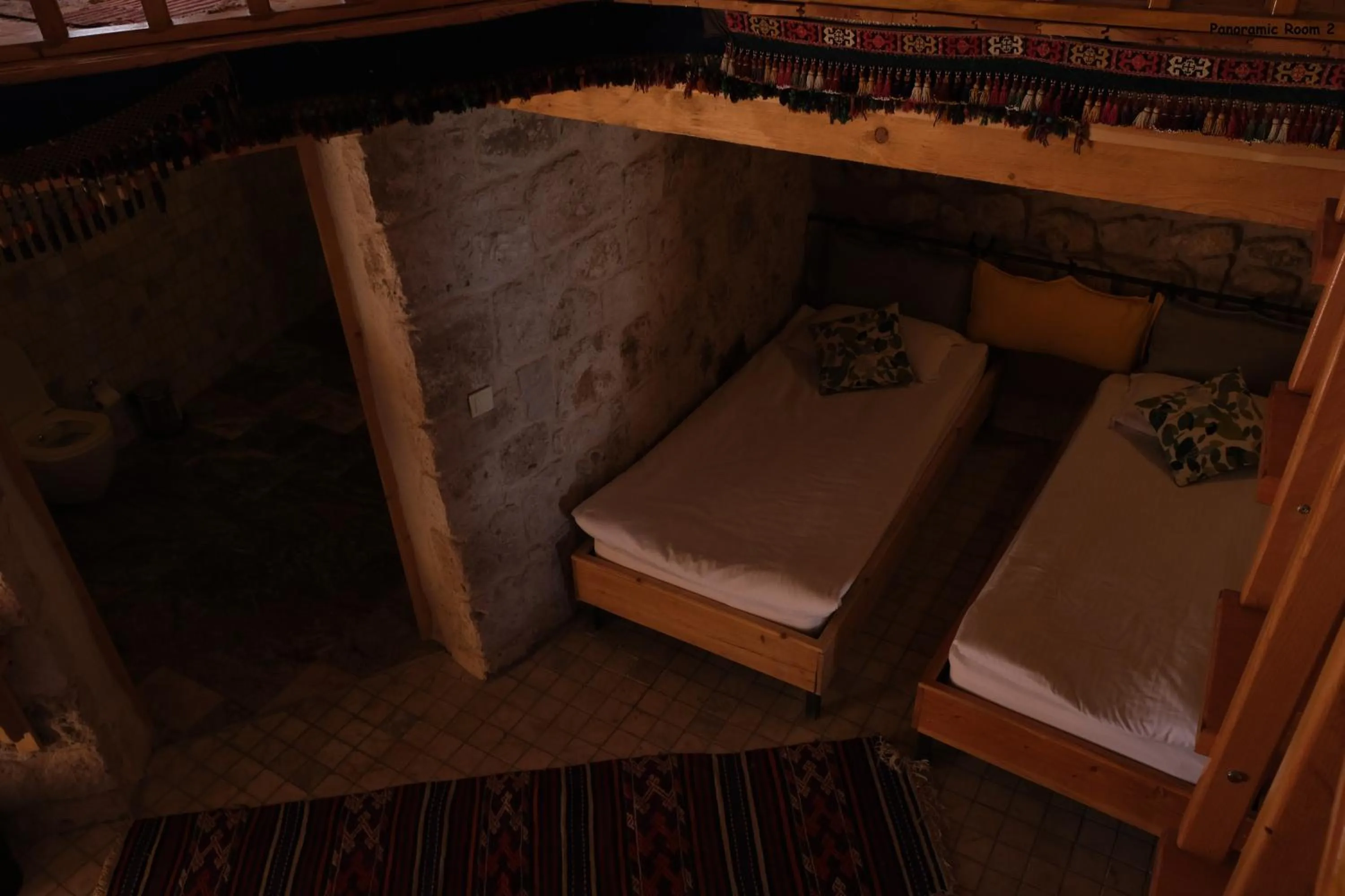 Bed in Pinhan Cave Suites