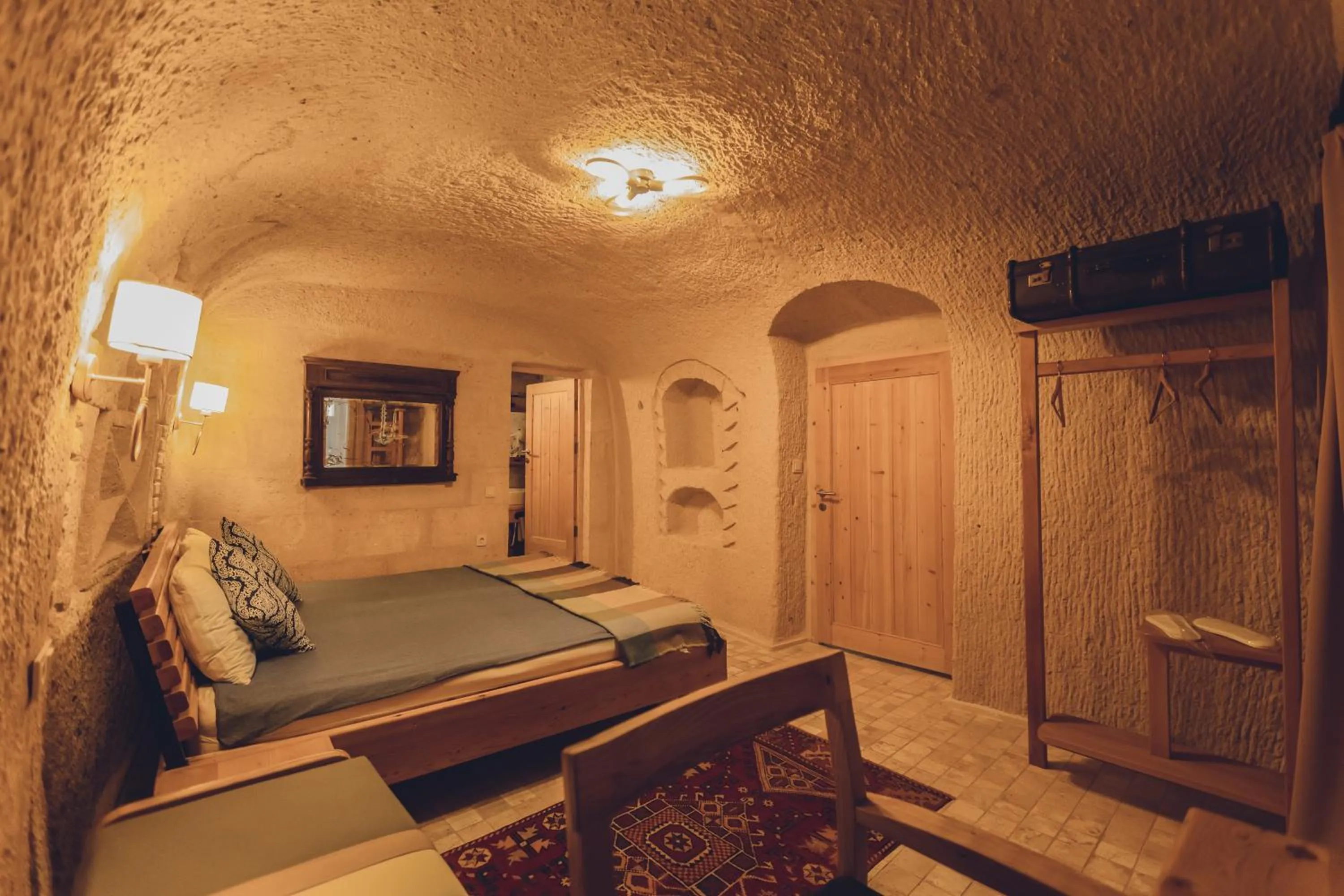 Bed in Pinhan Cave Suites