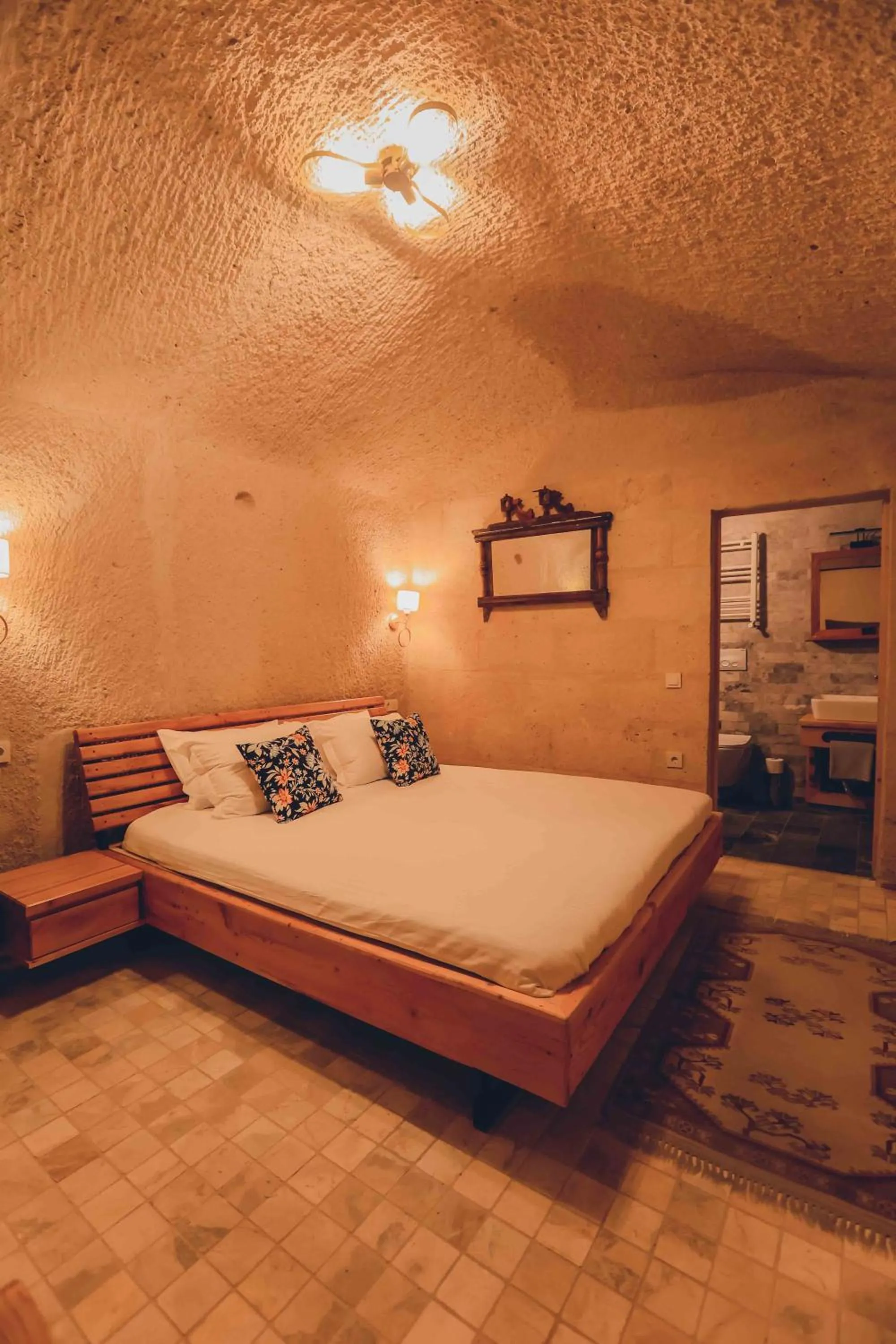 Bed in Pinhan Cave Suites