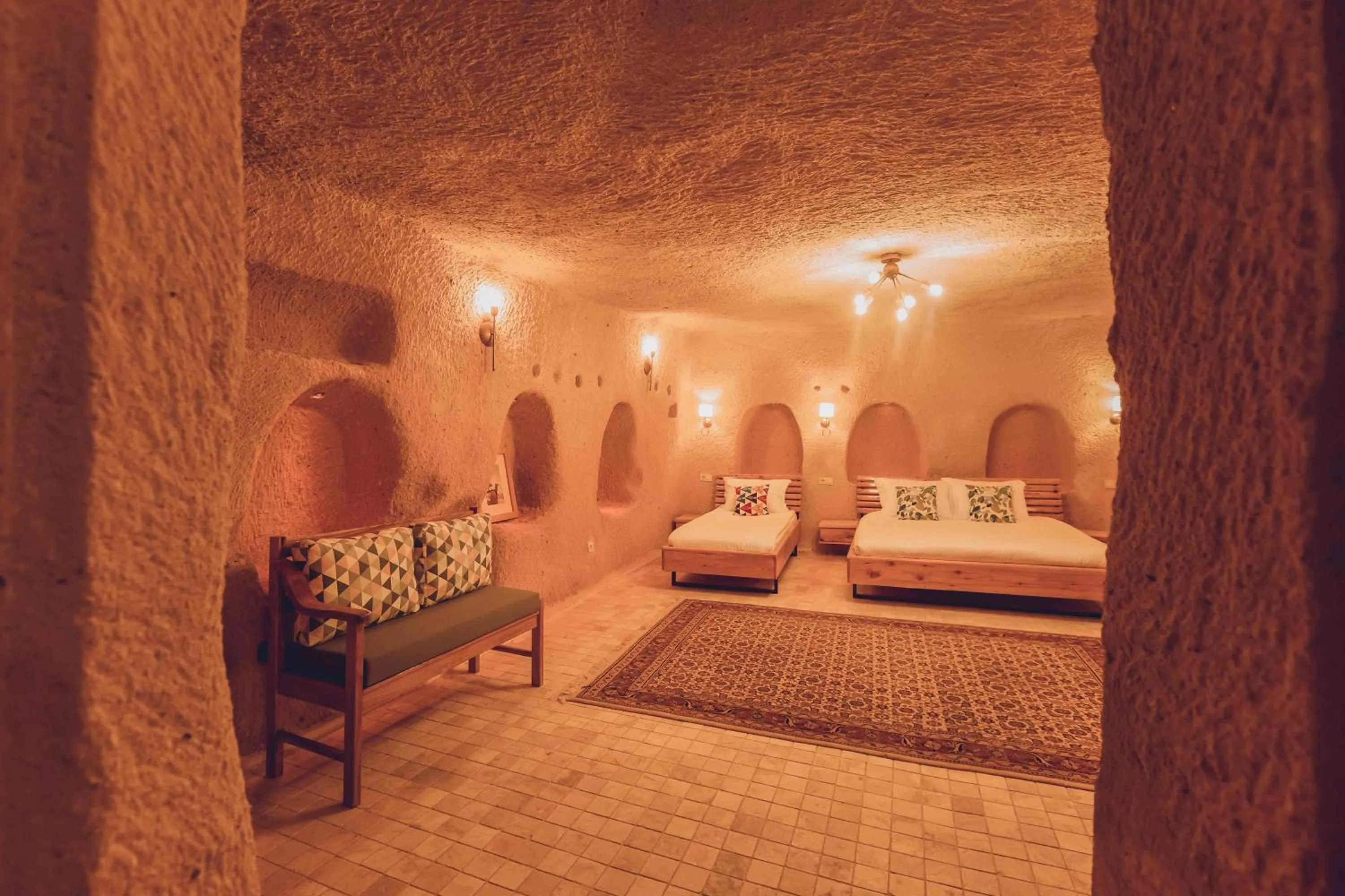 Bed in Pinhan Cave Suites
