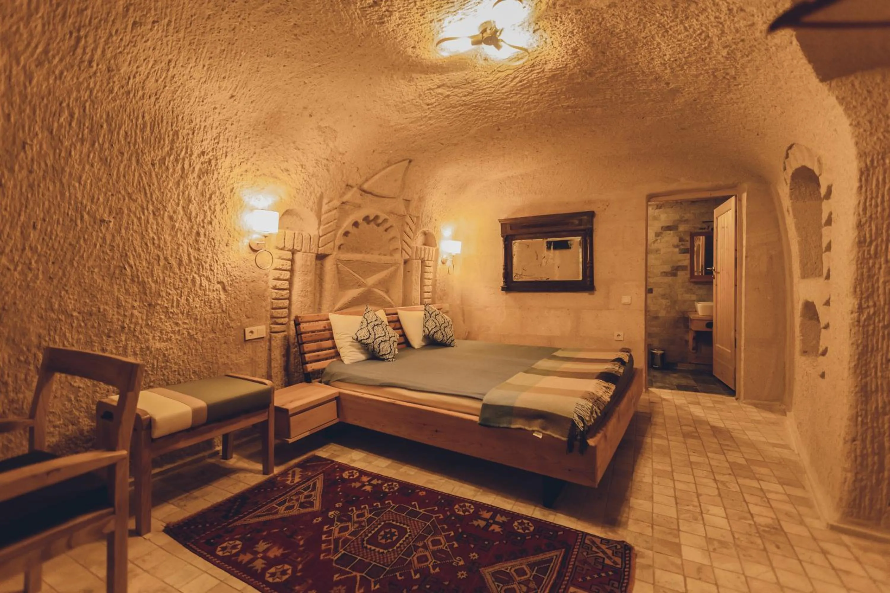 Bed in Pinhan Cave Suites