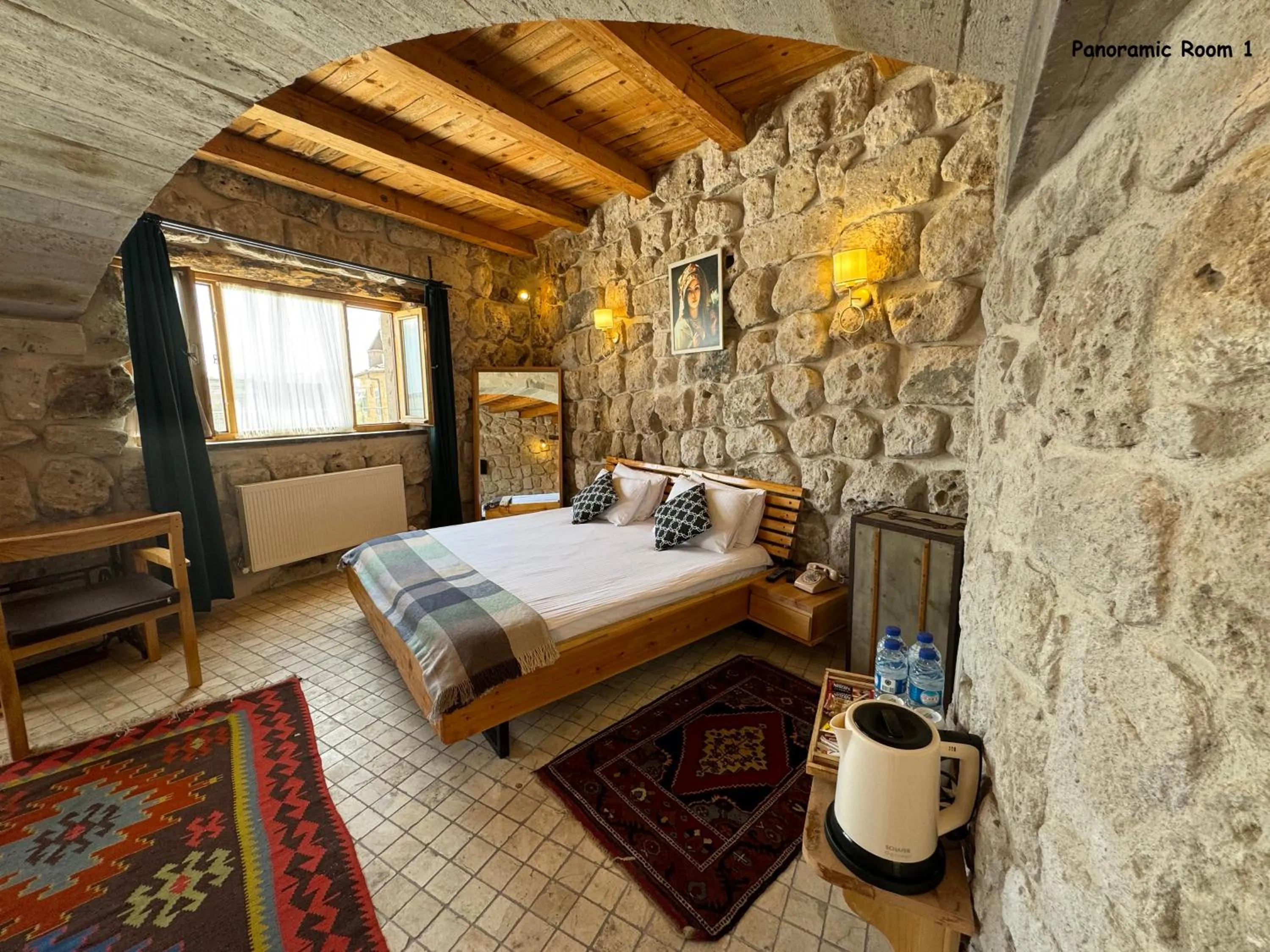 Bed in Pinhan Cave Suites