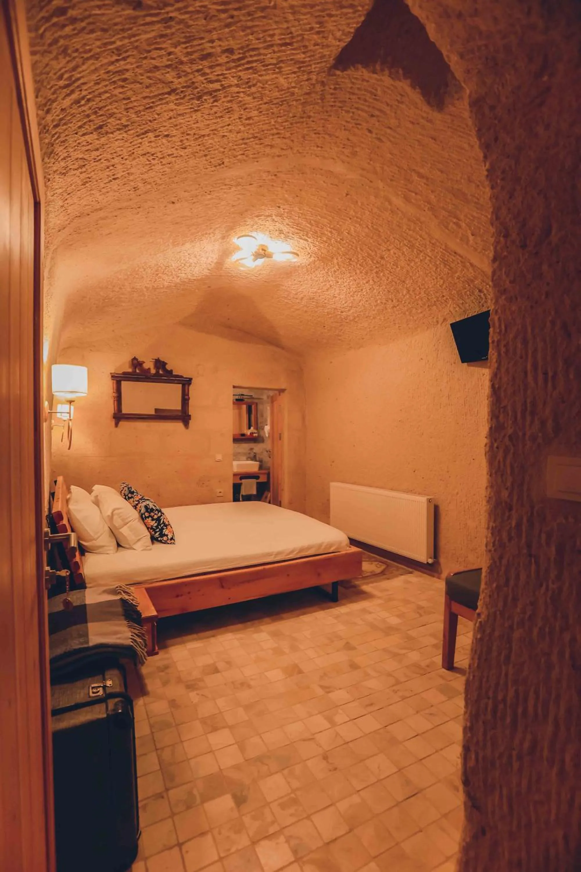 Bed in Pinhan Cave Suites