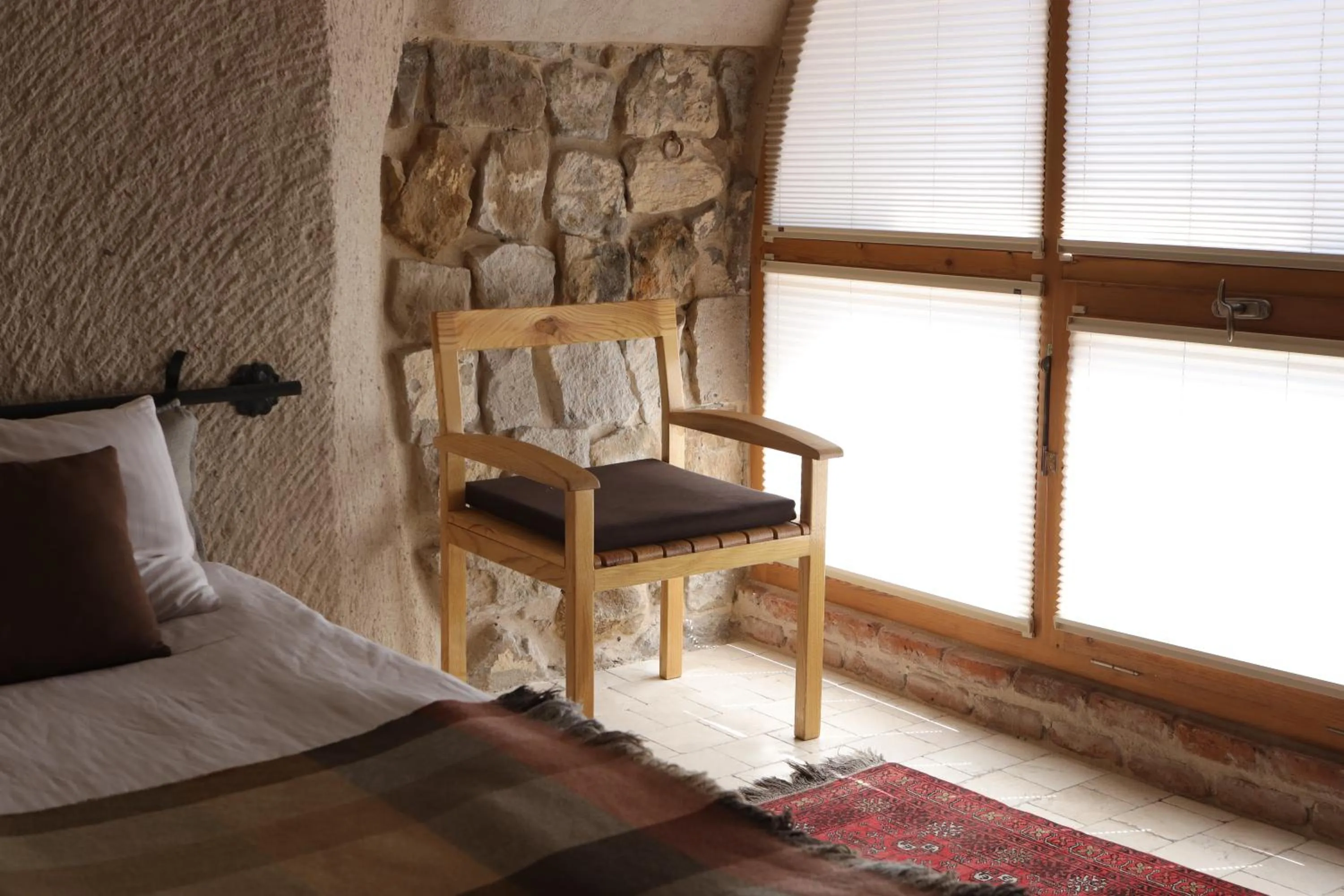 Bed in Pinhan Cave Suites