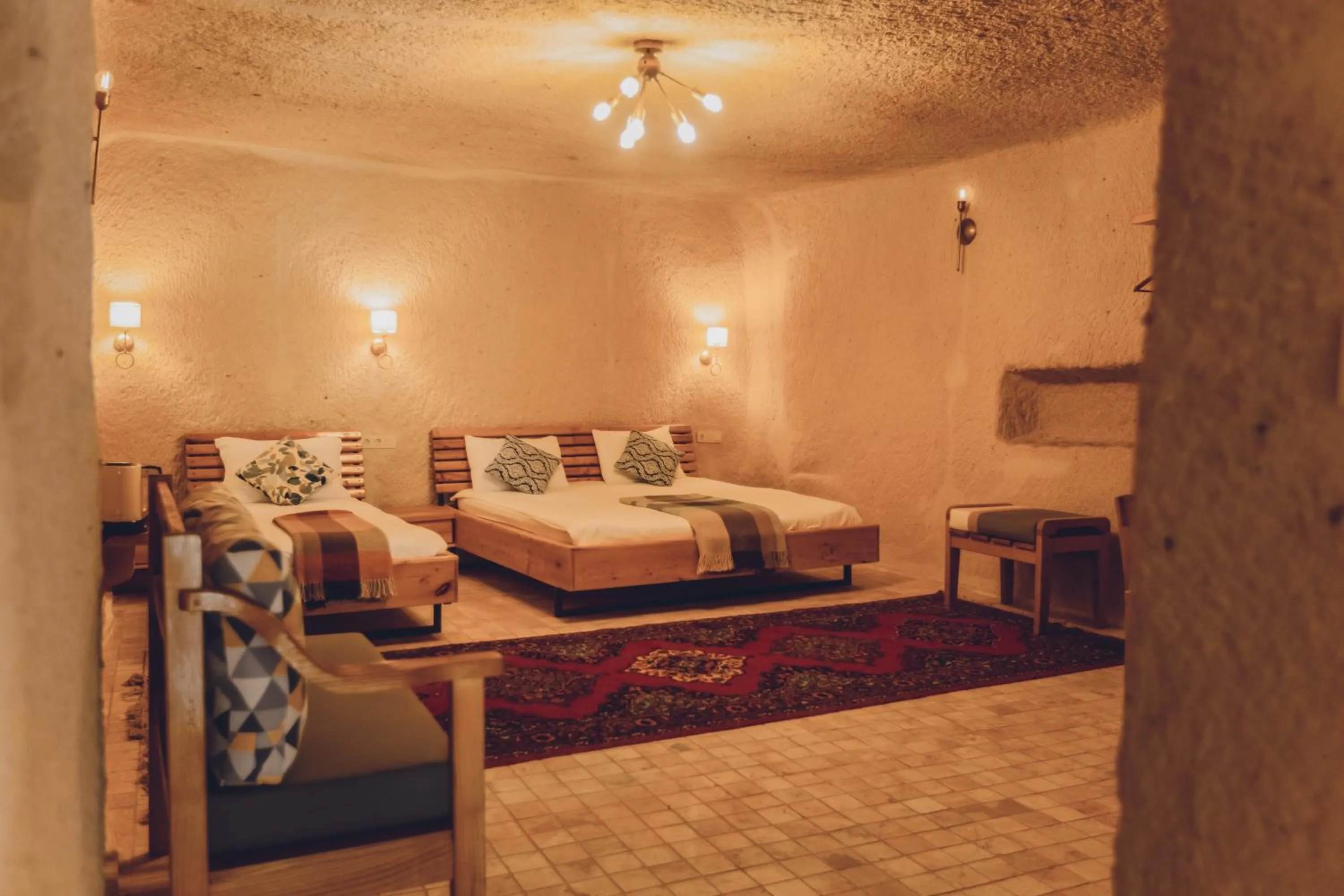 Bed in Pinhan Cave Suites