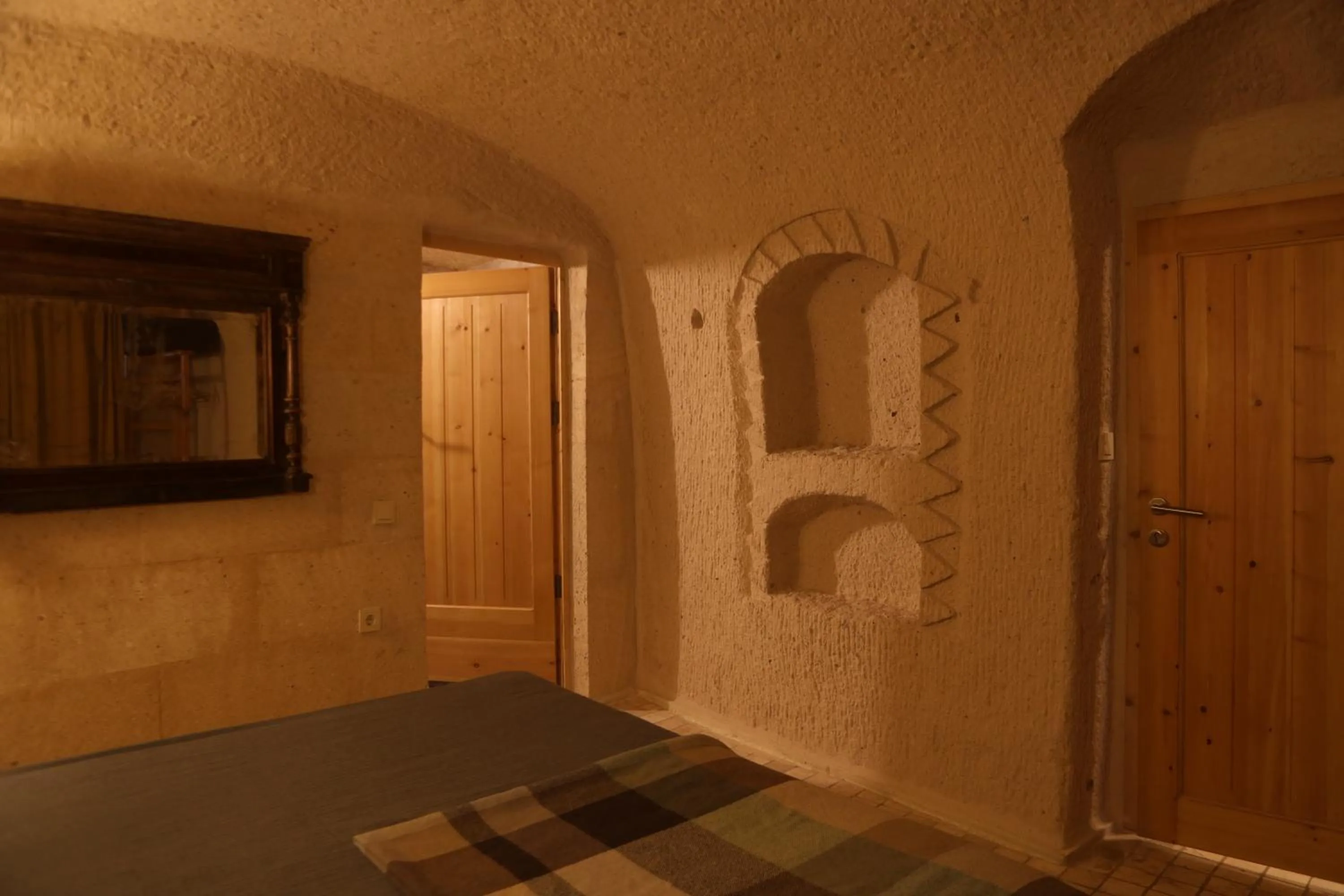 Bed in Pinhan Cave Suites