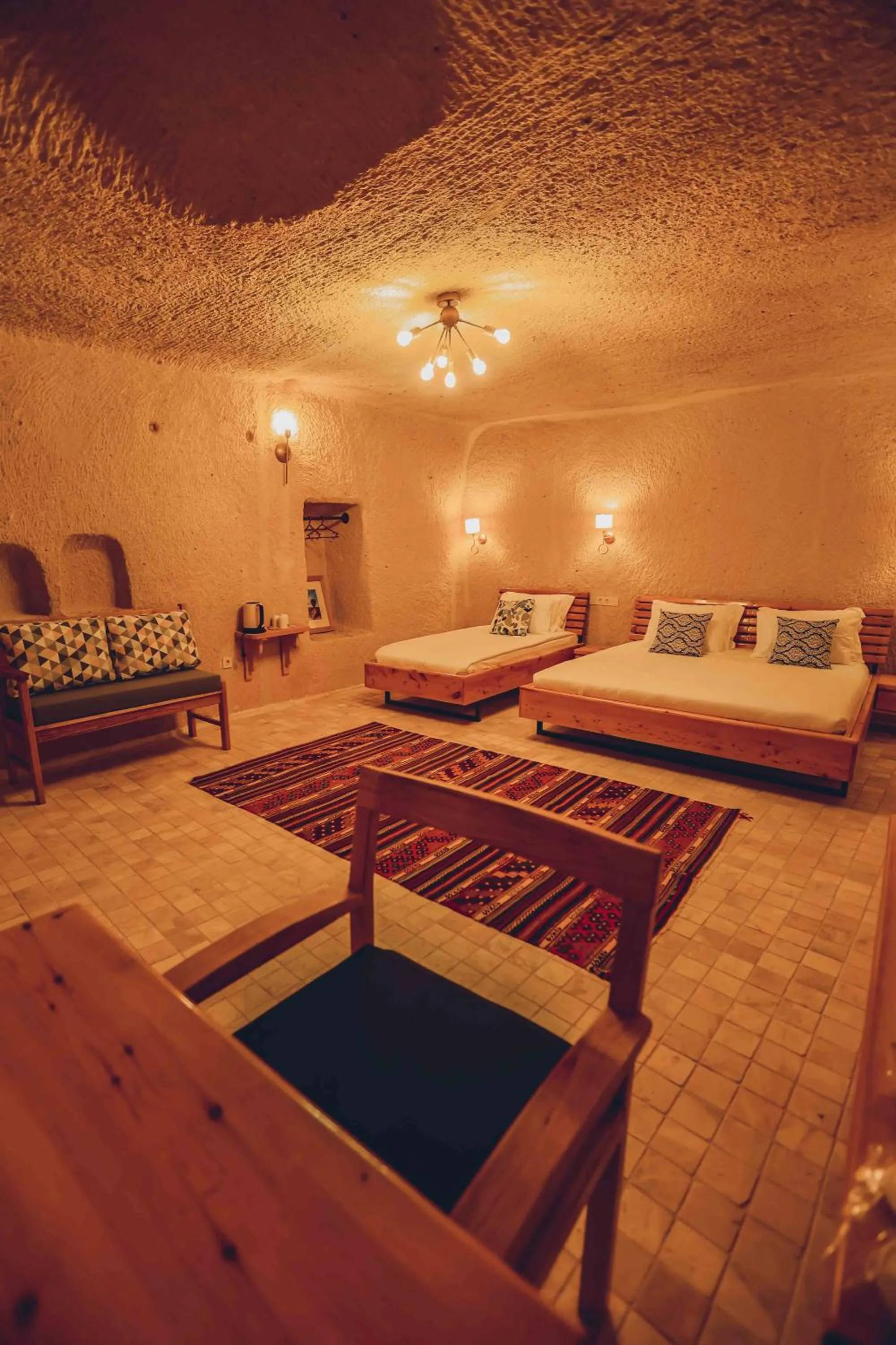 Bed in Pinhan Cave Suites