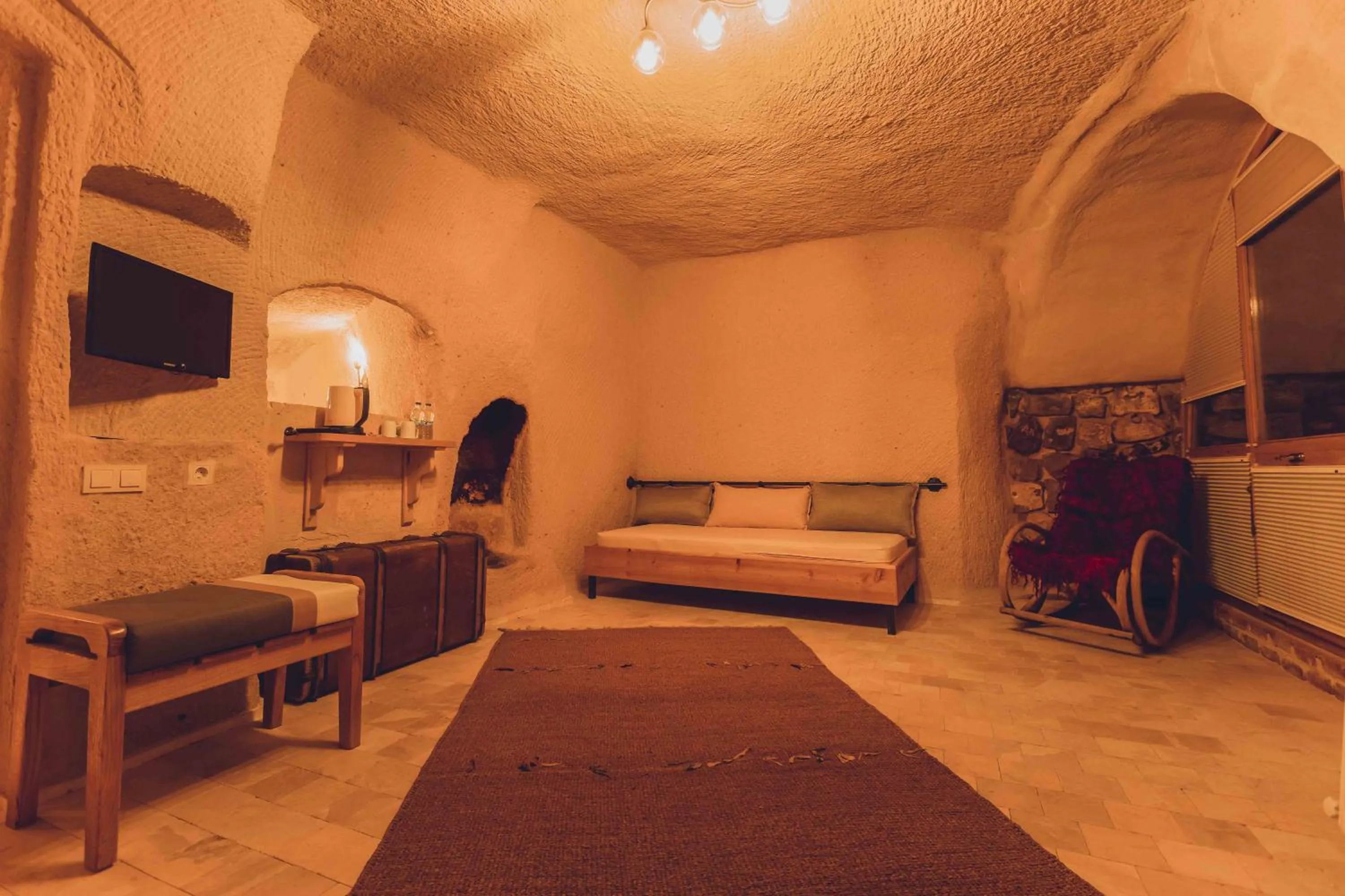 Bed in Pinhan Cave Suites