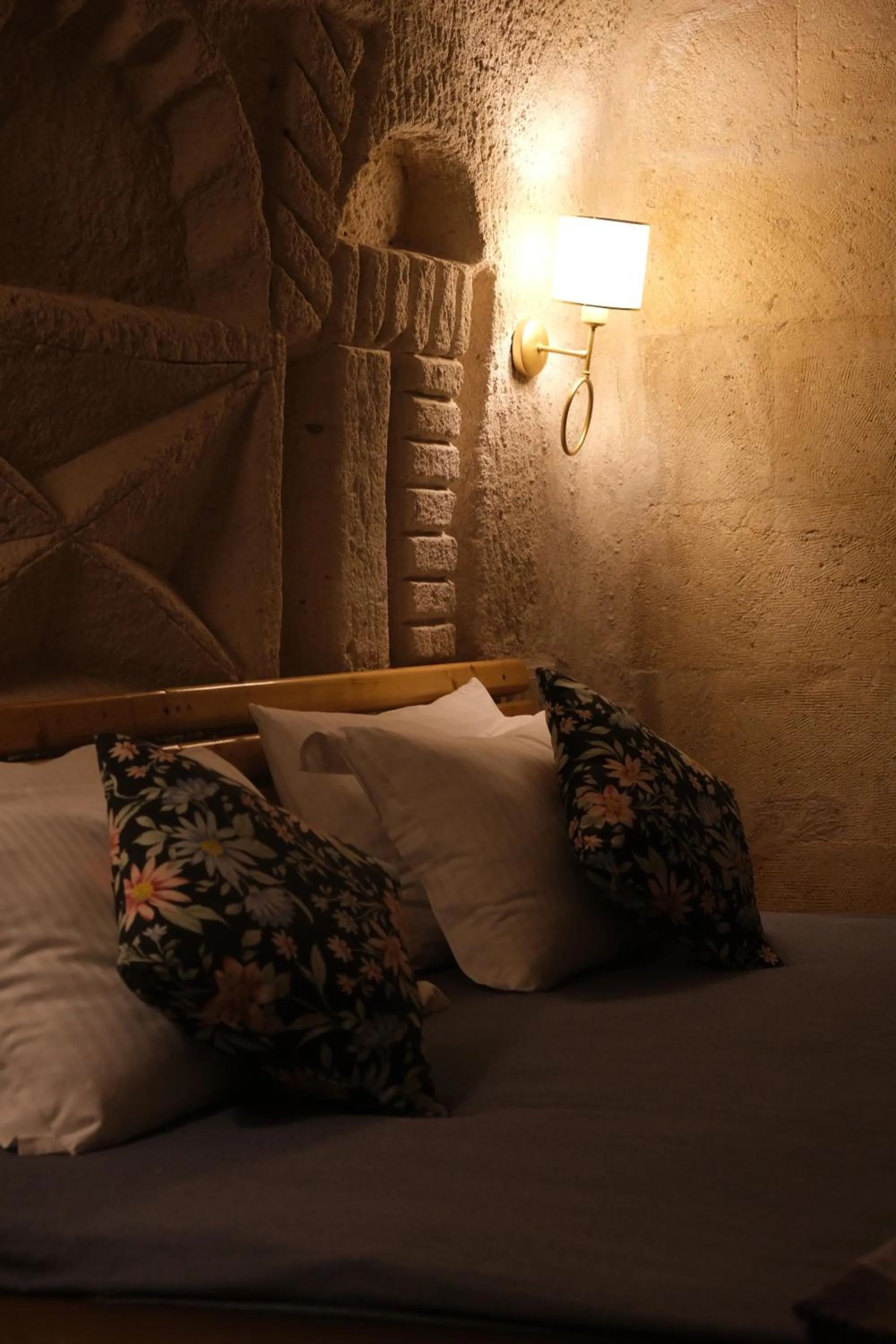 Bed in Pinhan Cave Suites