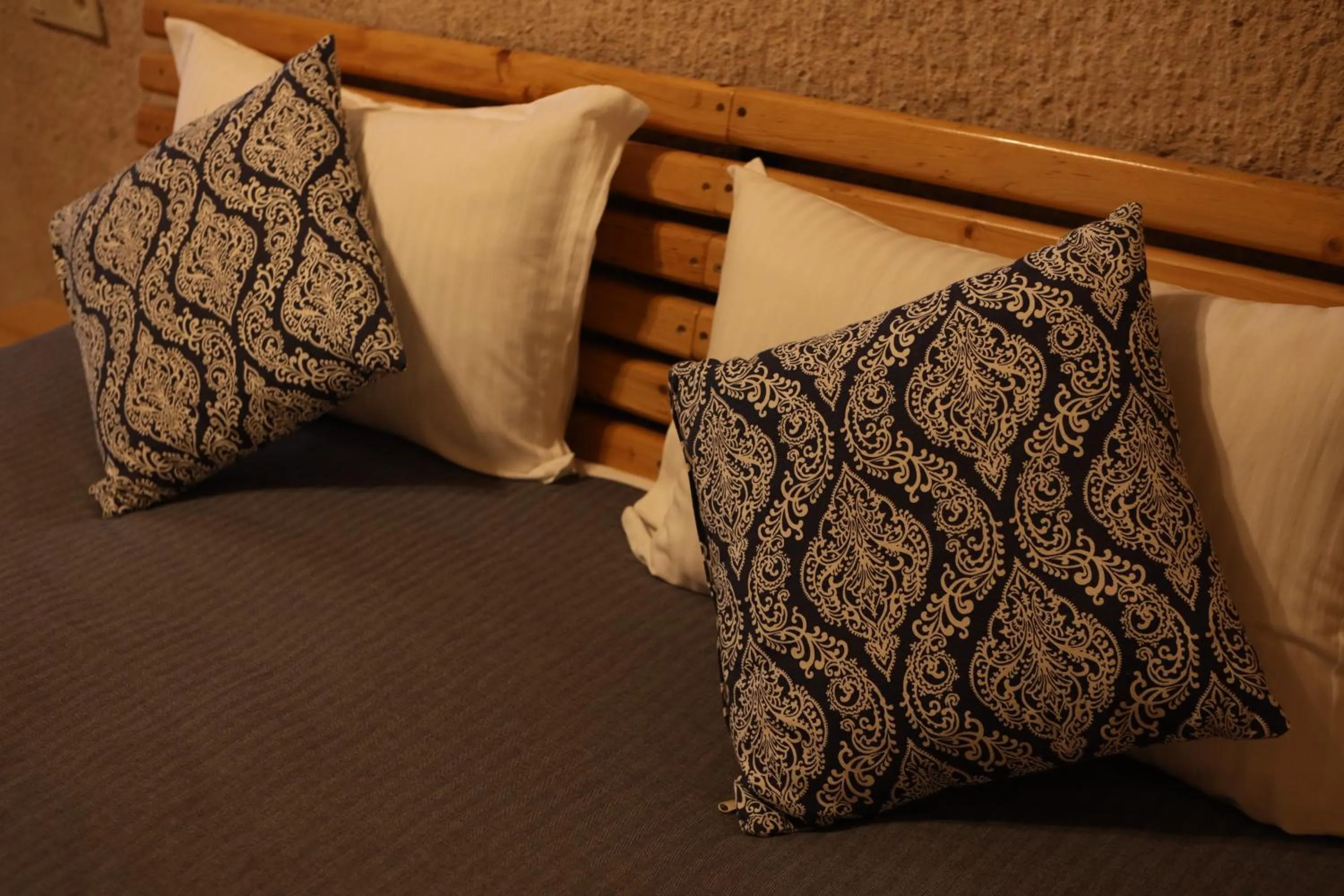 Bed in Pinhan Cave Suites