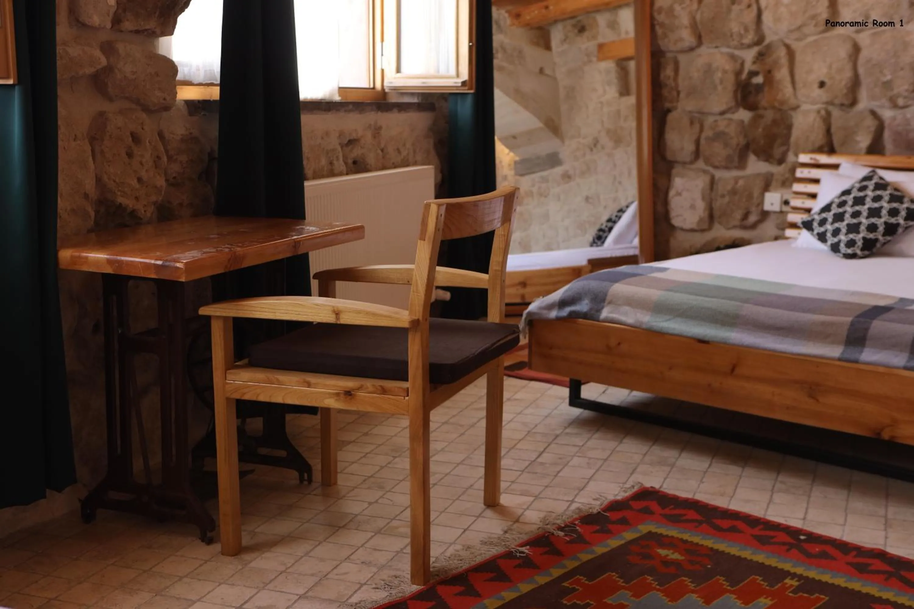 Bed in Pinhan Cave Suites