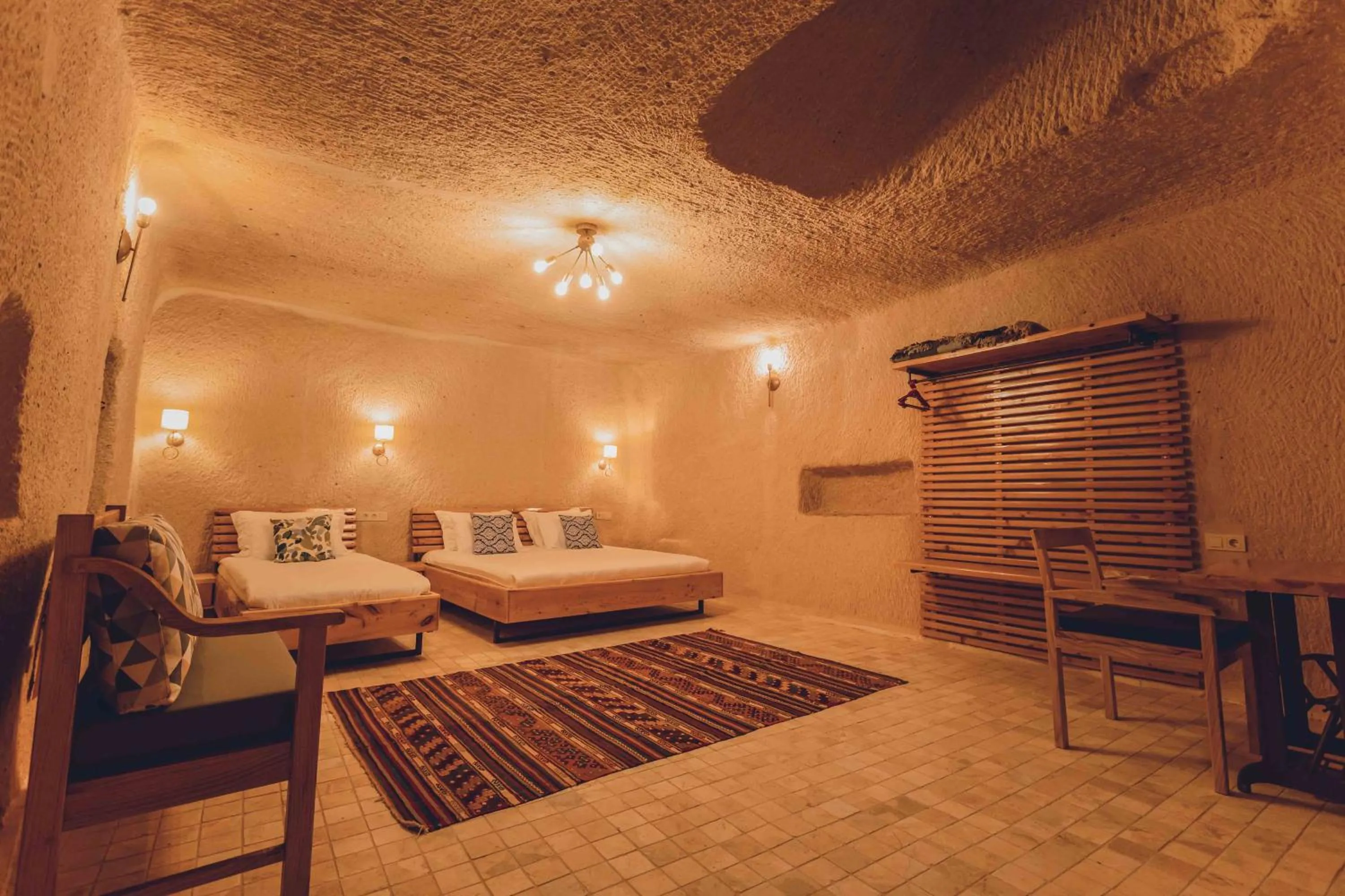 Bed in Pinhan Cave Suites
