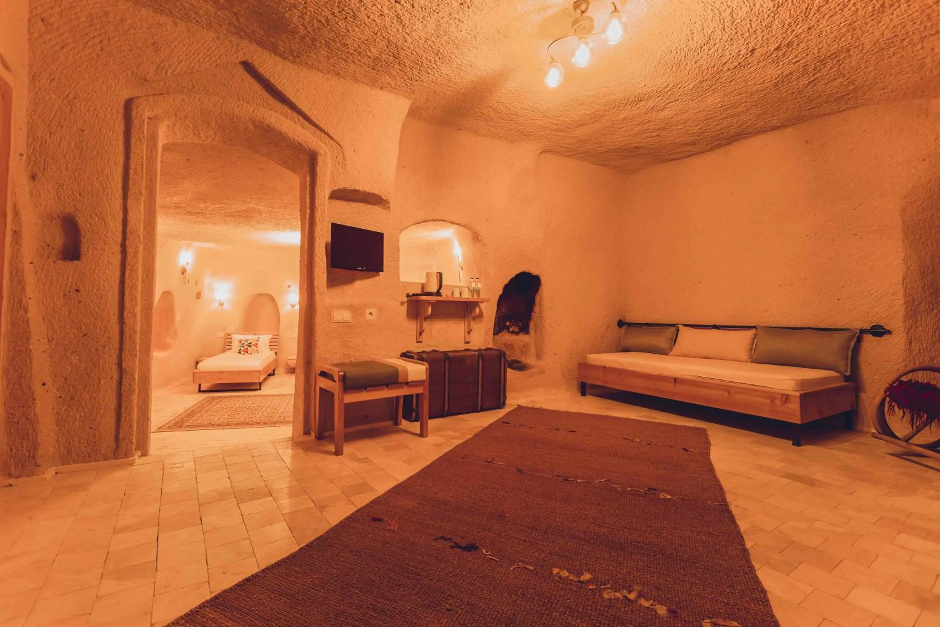 TV and multimedia, Bed in Pinhan Cave Suites