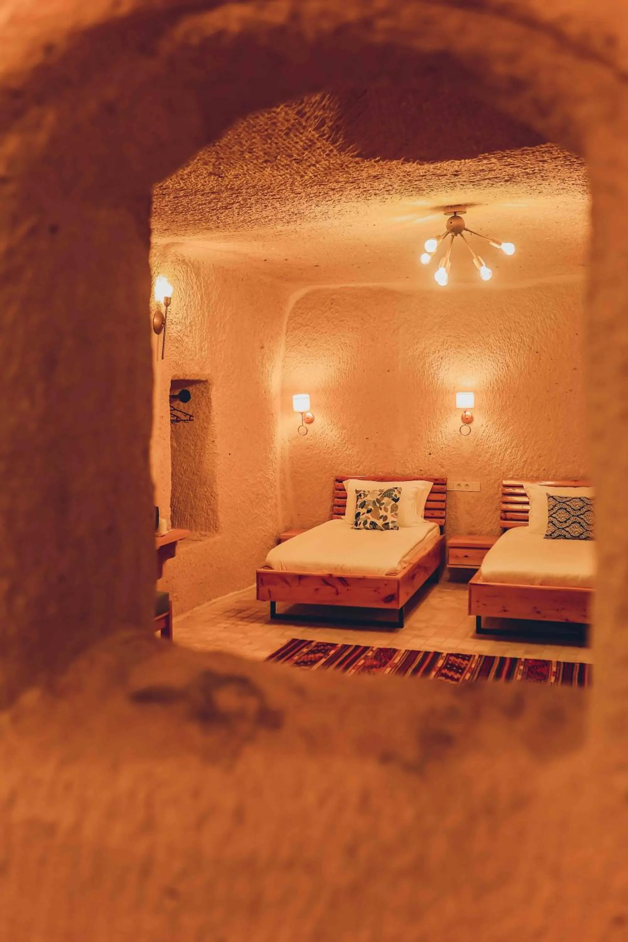 Bed in Pinhan Cave Suites