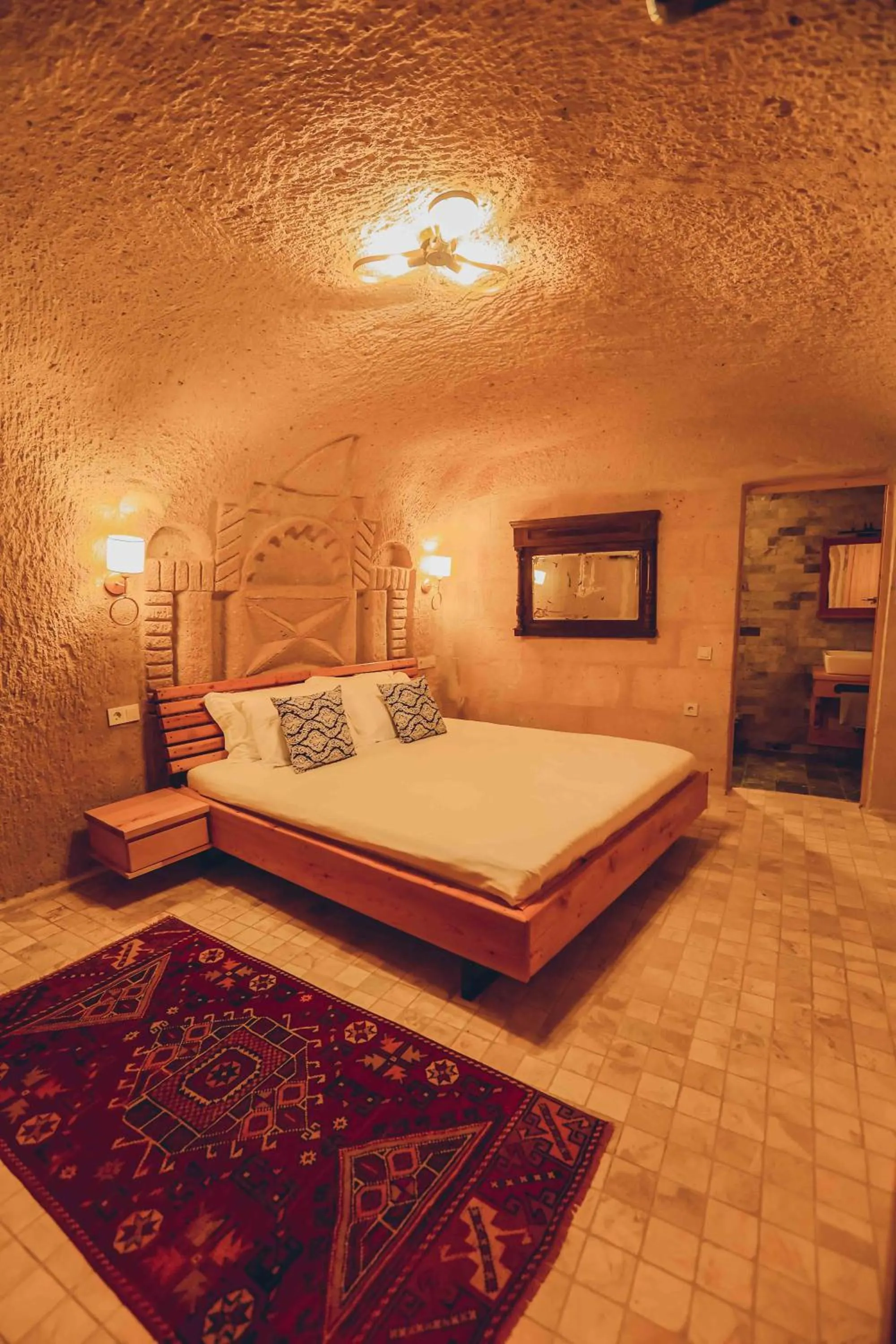 Bed in Pinhan Cave Suites