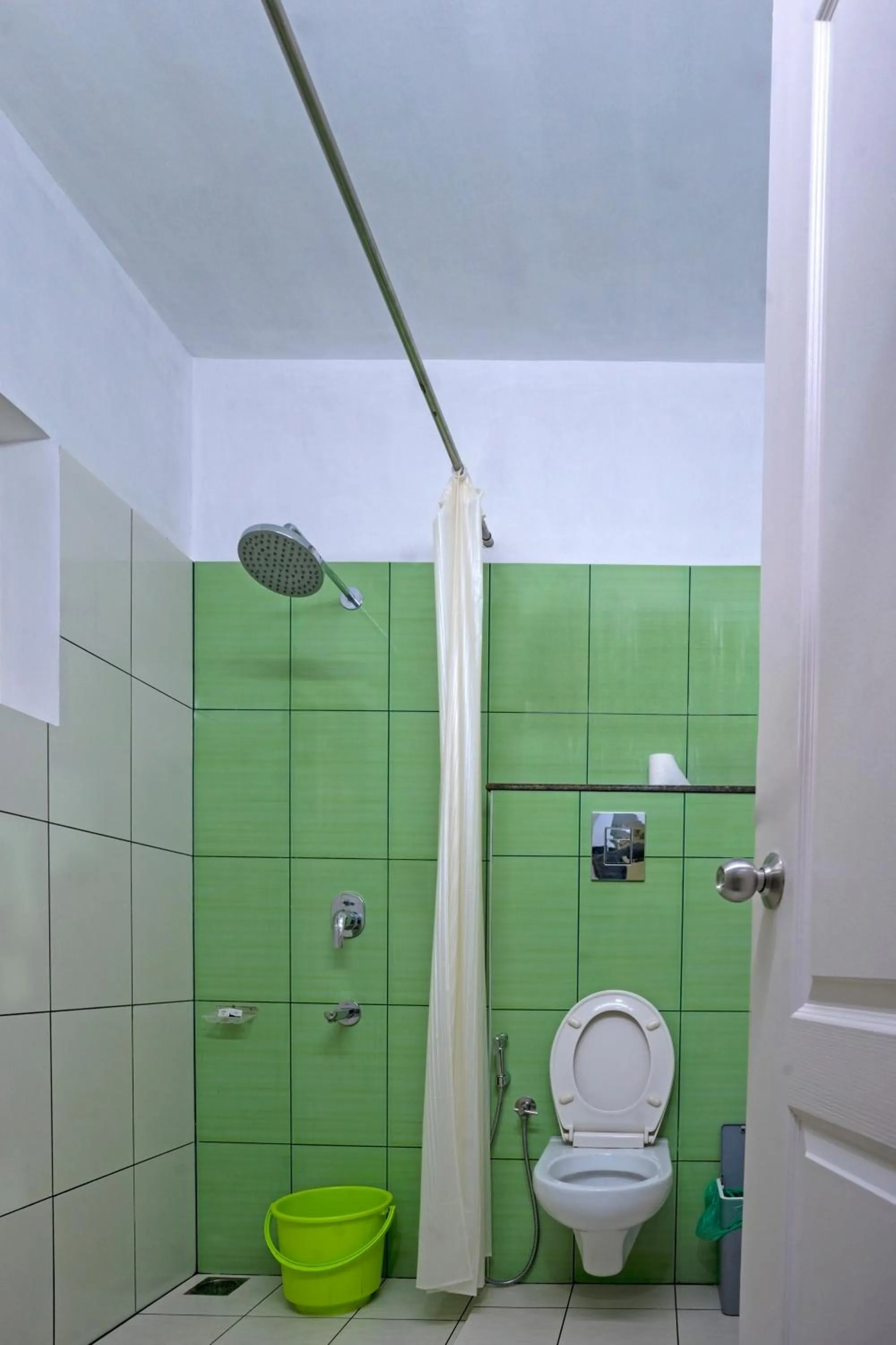 Bathroom in Vasudevam Premium Suites