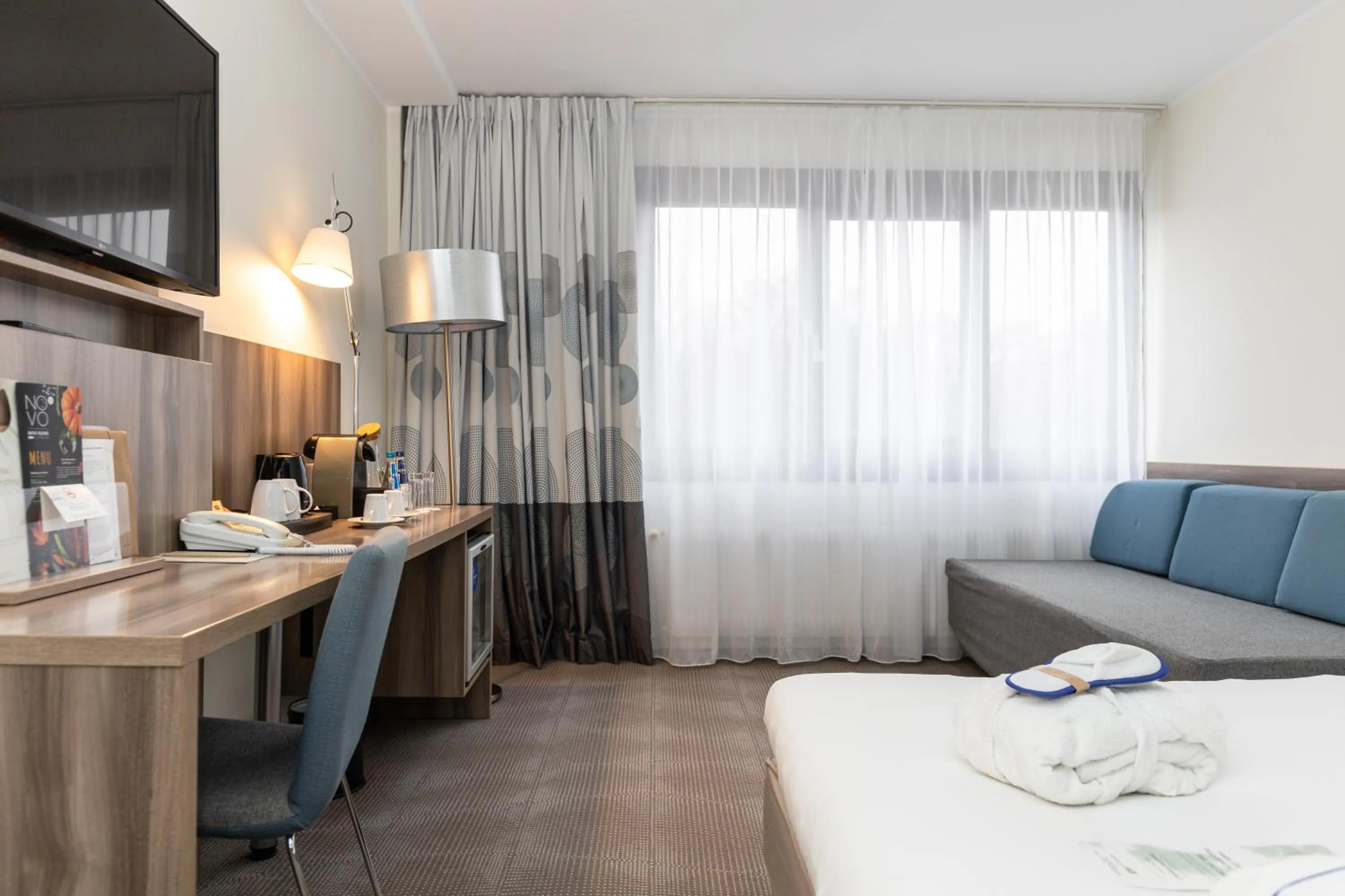 Bed in Novotel Poznań Malta