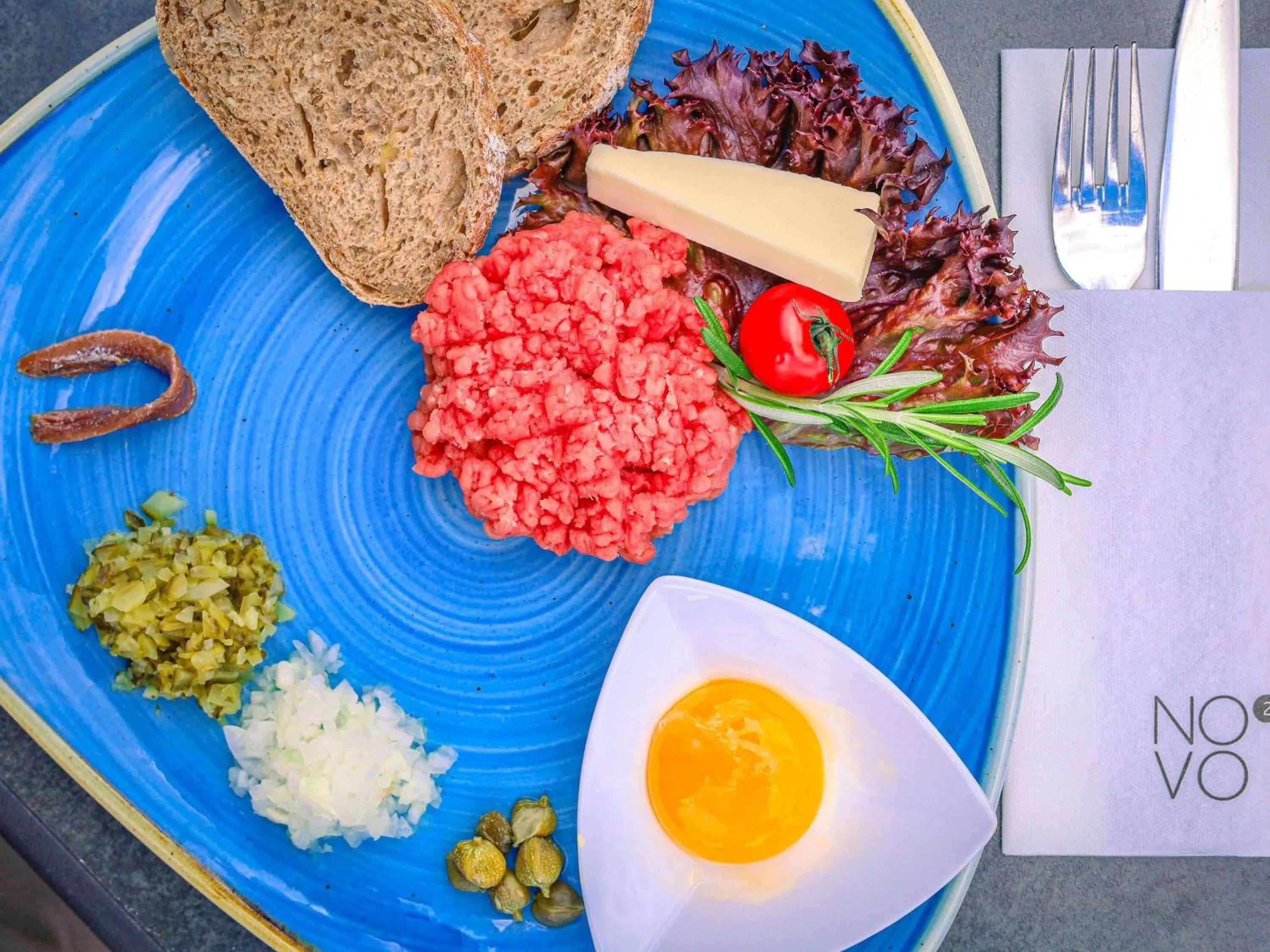 Restaurant/places to eat in Novotel Poznań Malta