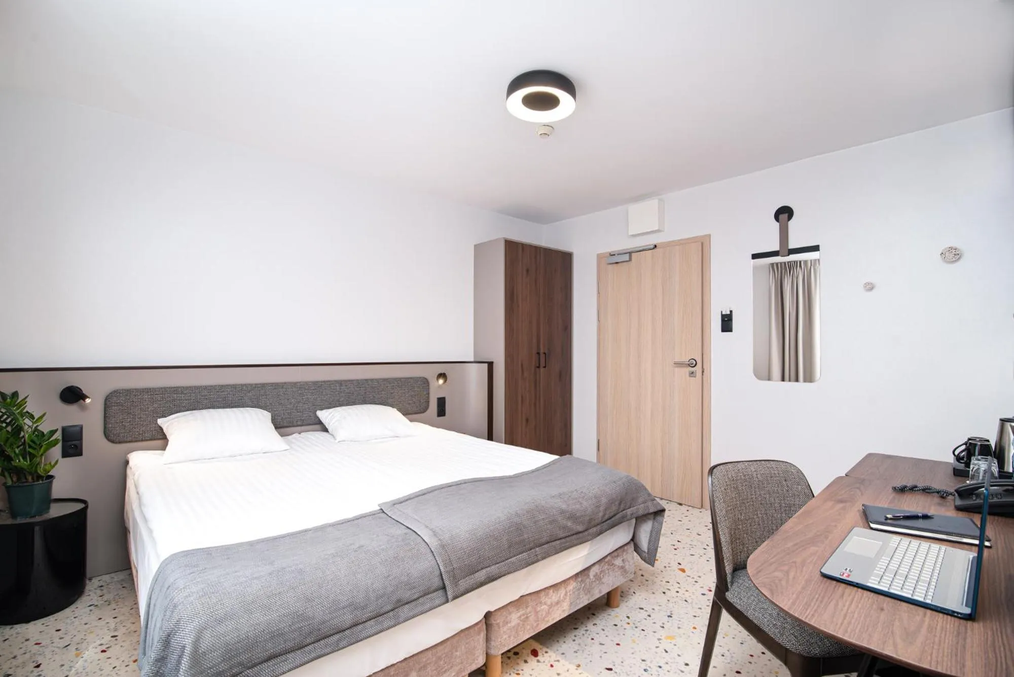 Bed in Antares Hotel