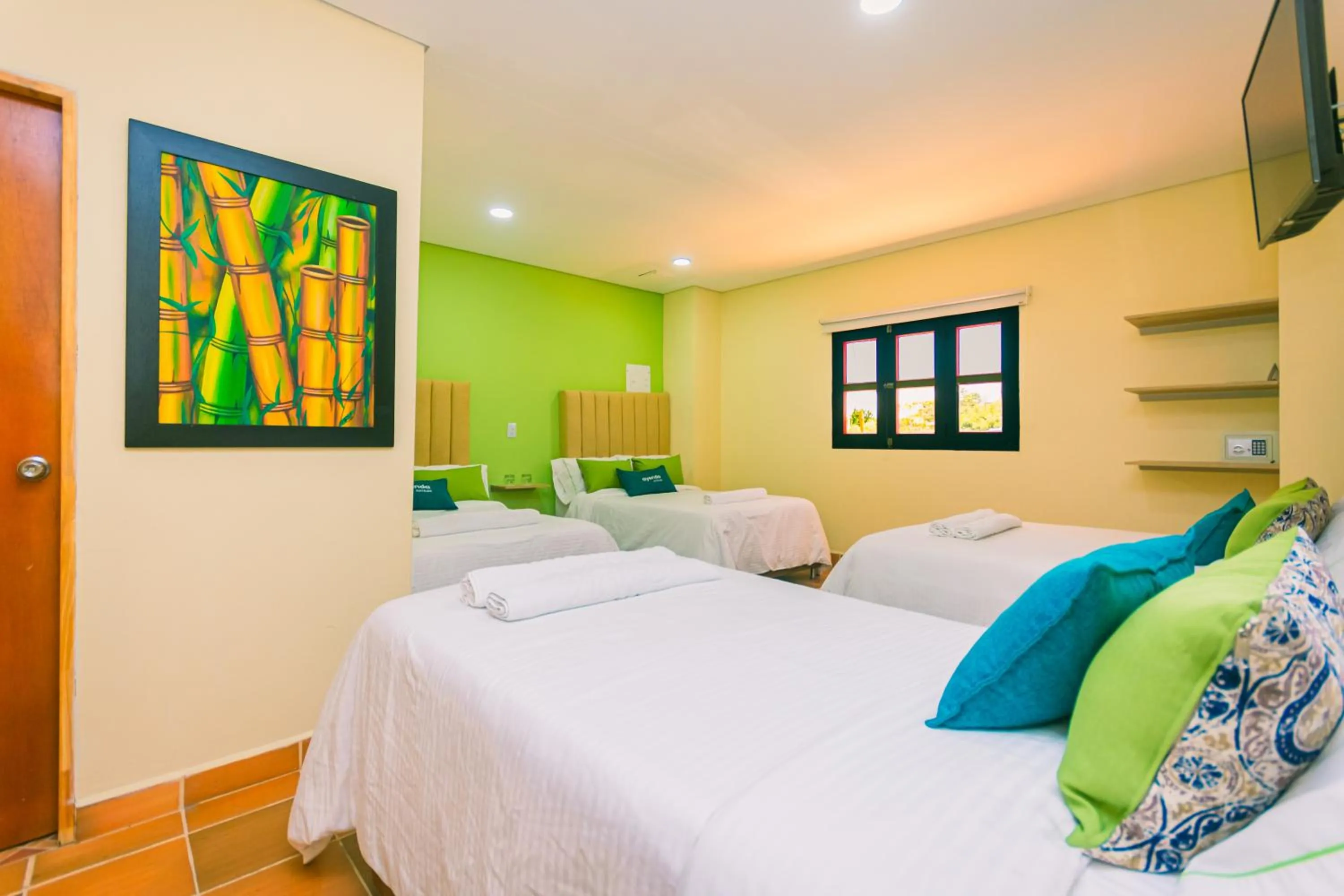 Bed in Hotel Bambu Guatape