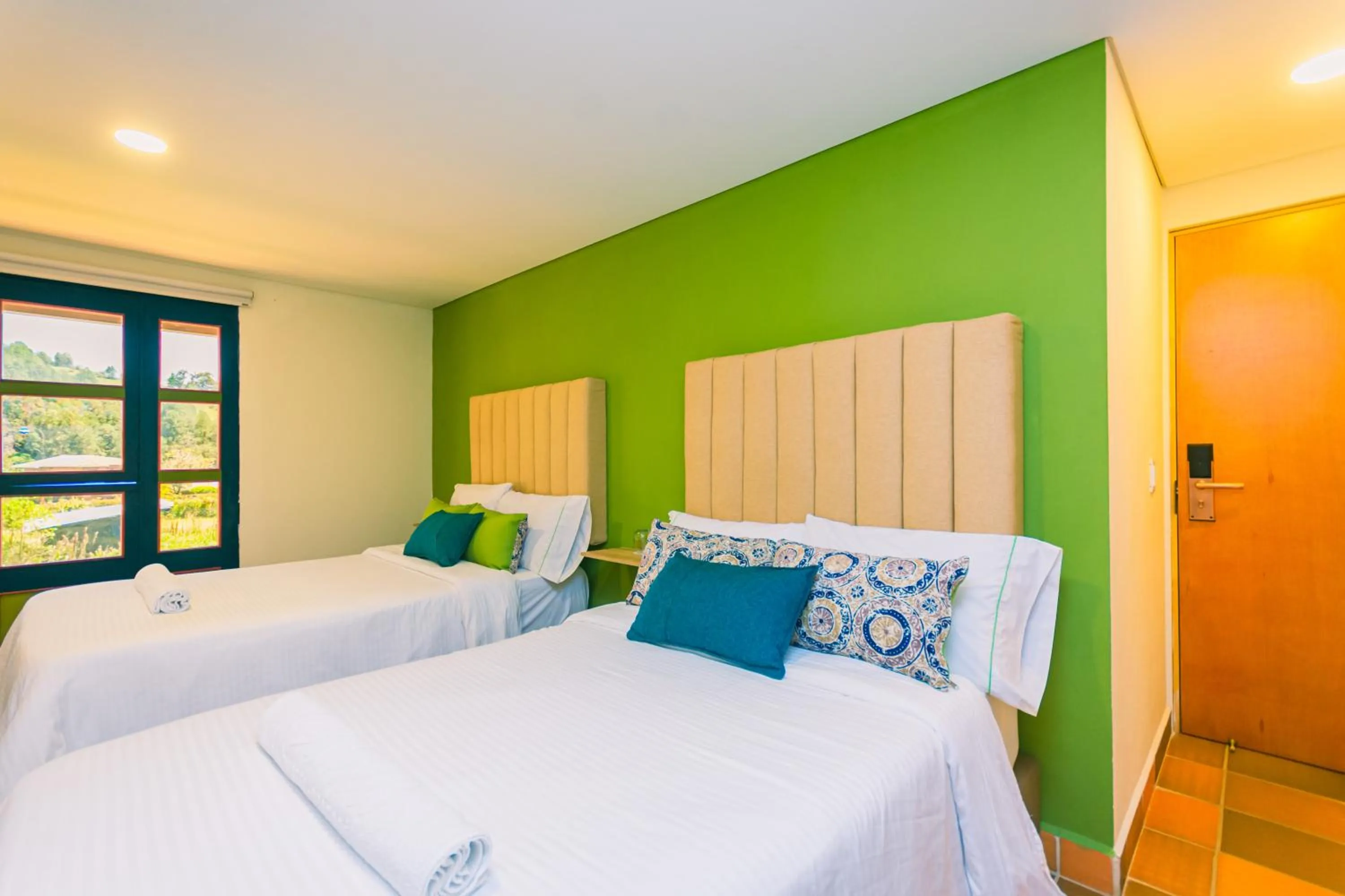 Bed in Hotel Bambu Guatape