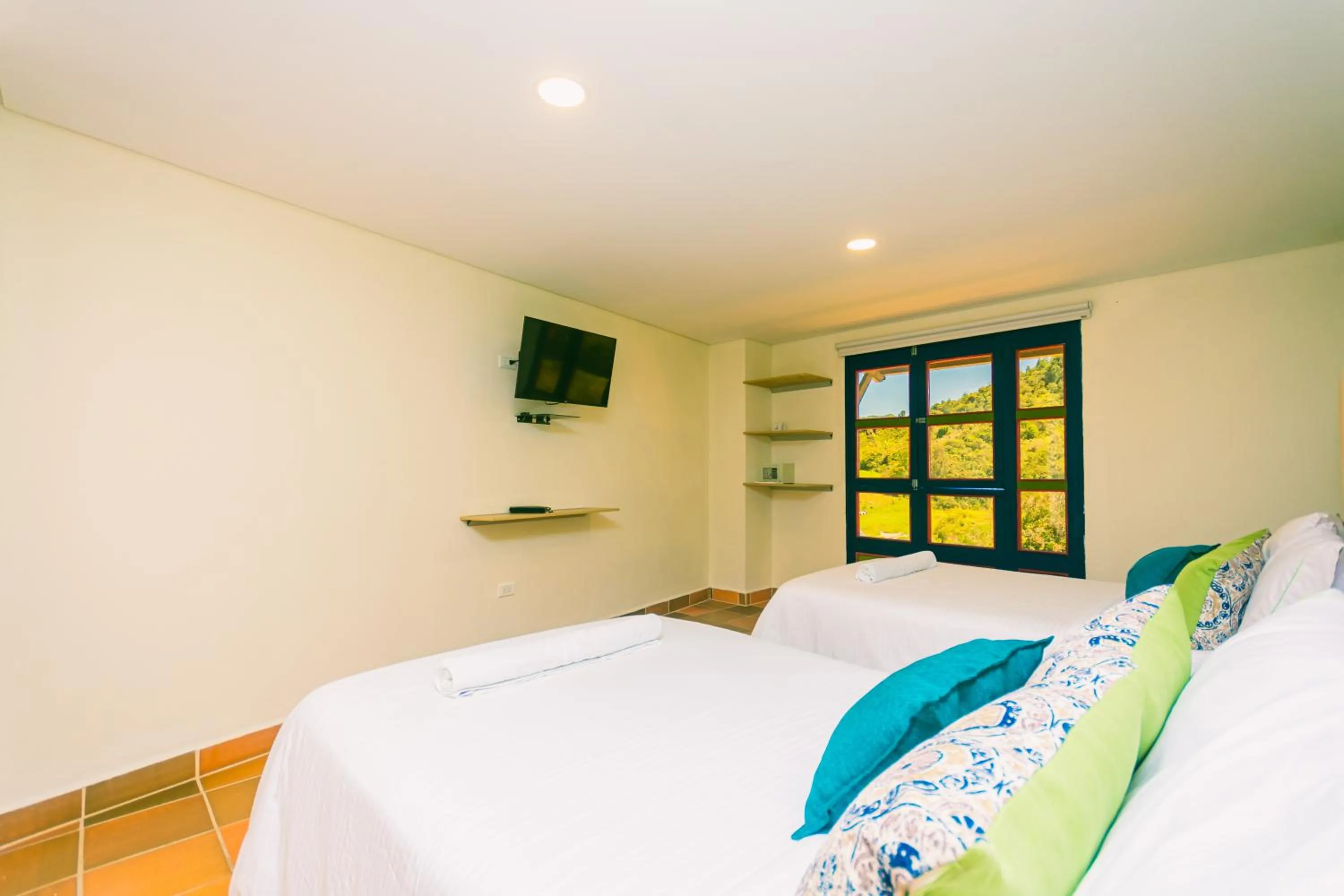 Bed in Hotel Bambu Guatape