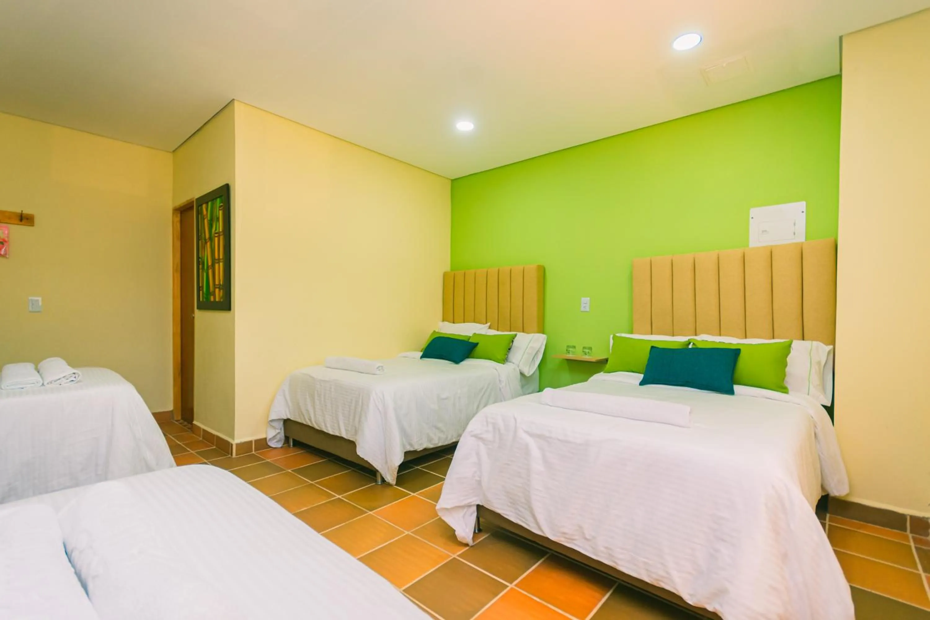 Bed in Hotel Bambu Guatape