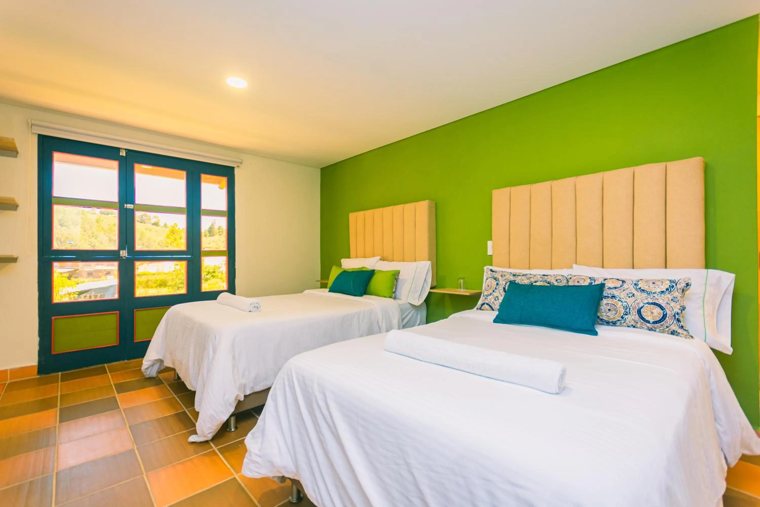 Bed in Hotel Bambu Guatape