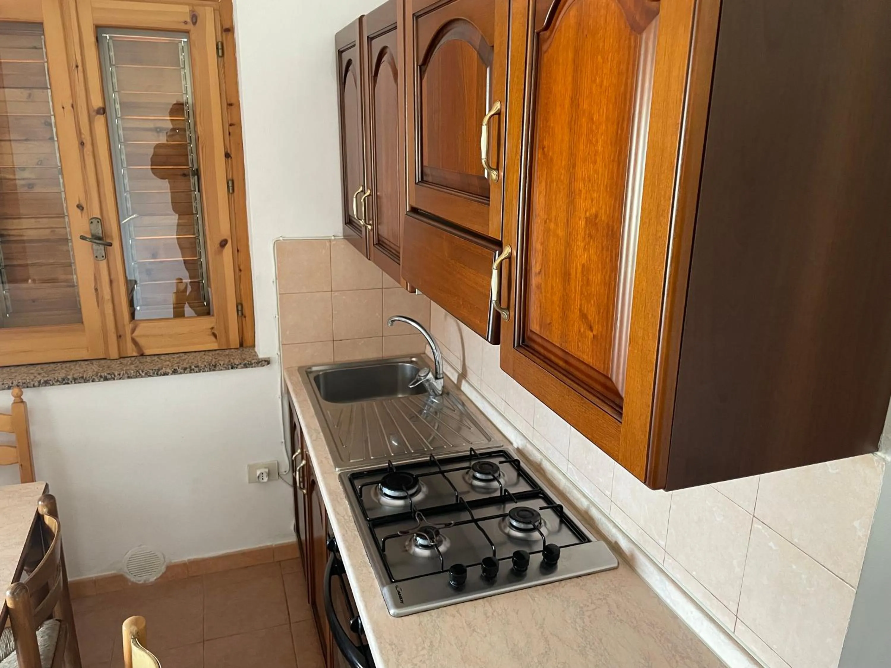 Kitchen or kitchenette in Villaggio Camping La Scogliera