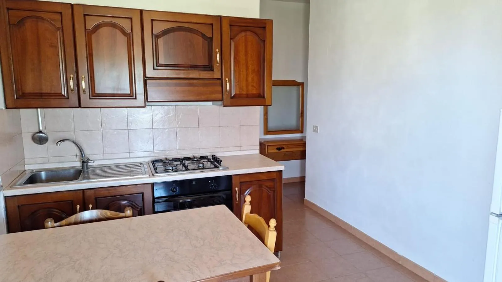 Kitchen or kitchenette in Villaggio Camping La Scogliera