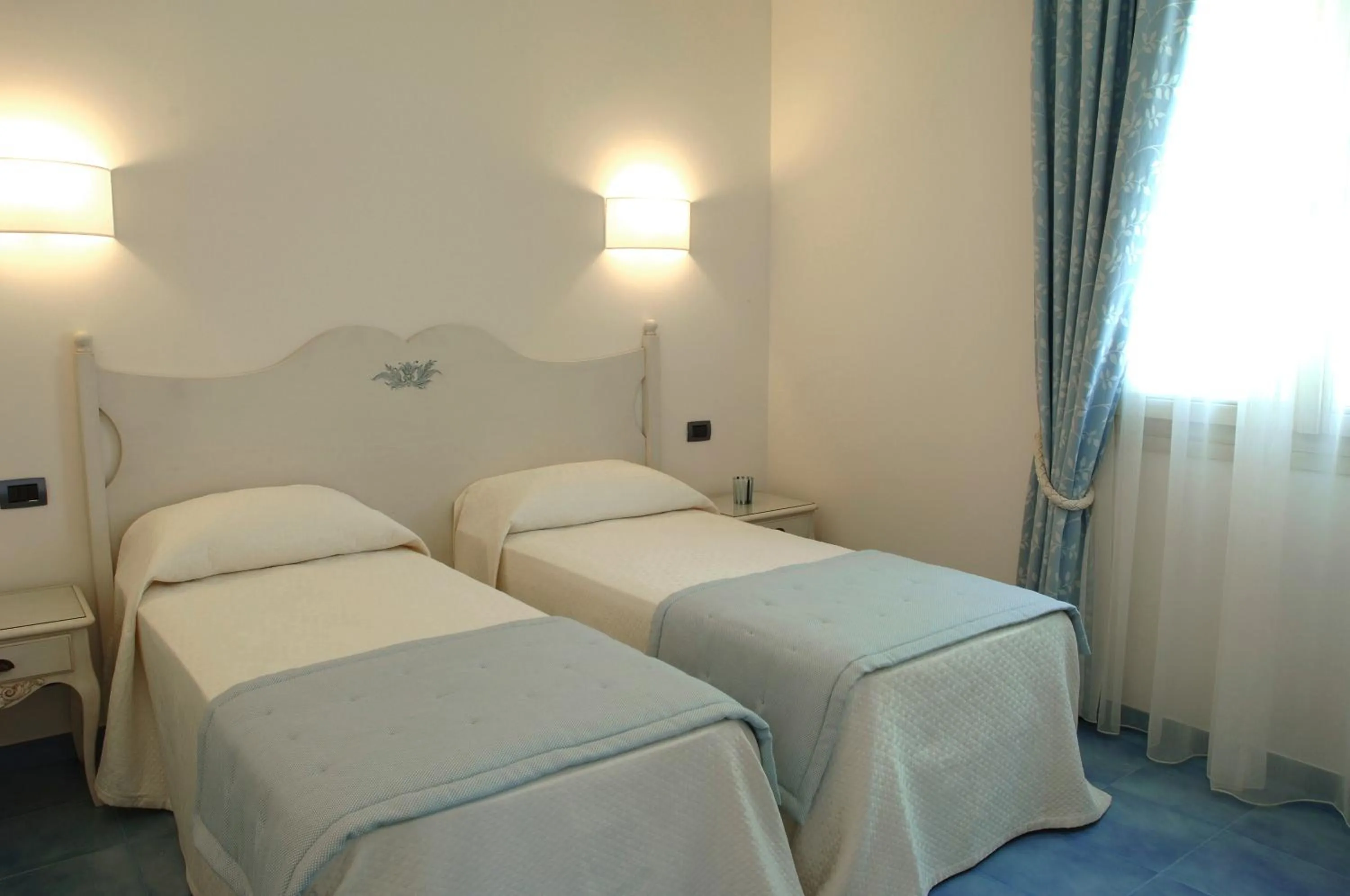 Bed in Baia Delphis Resort