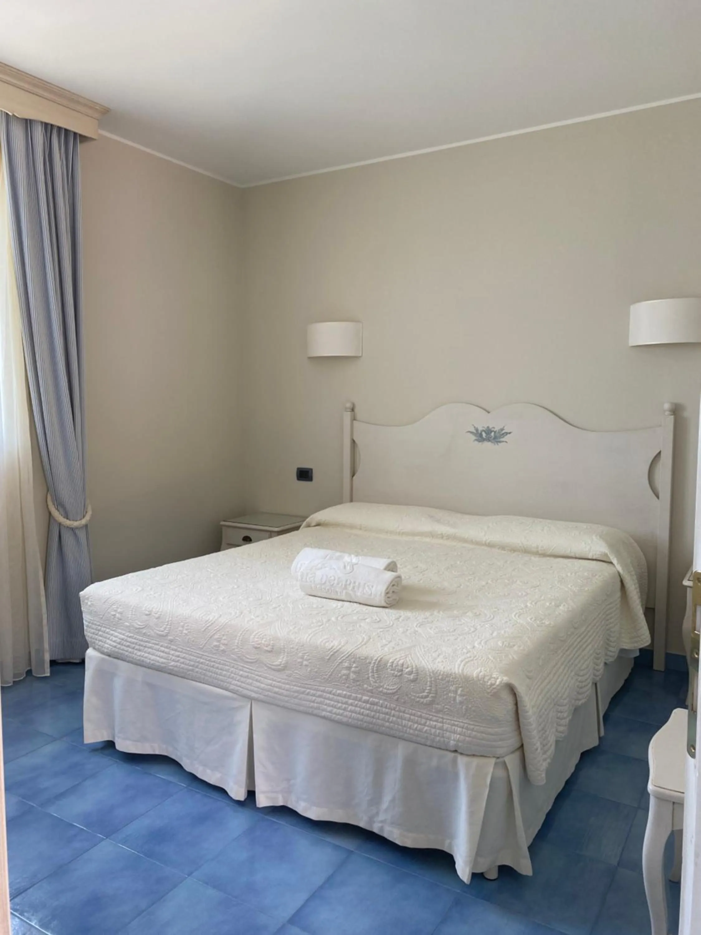 Bed in Baia Delphis Resort