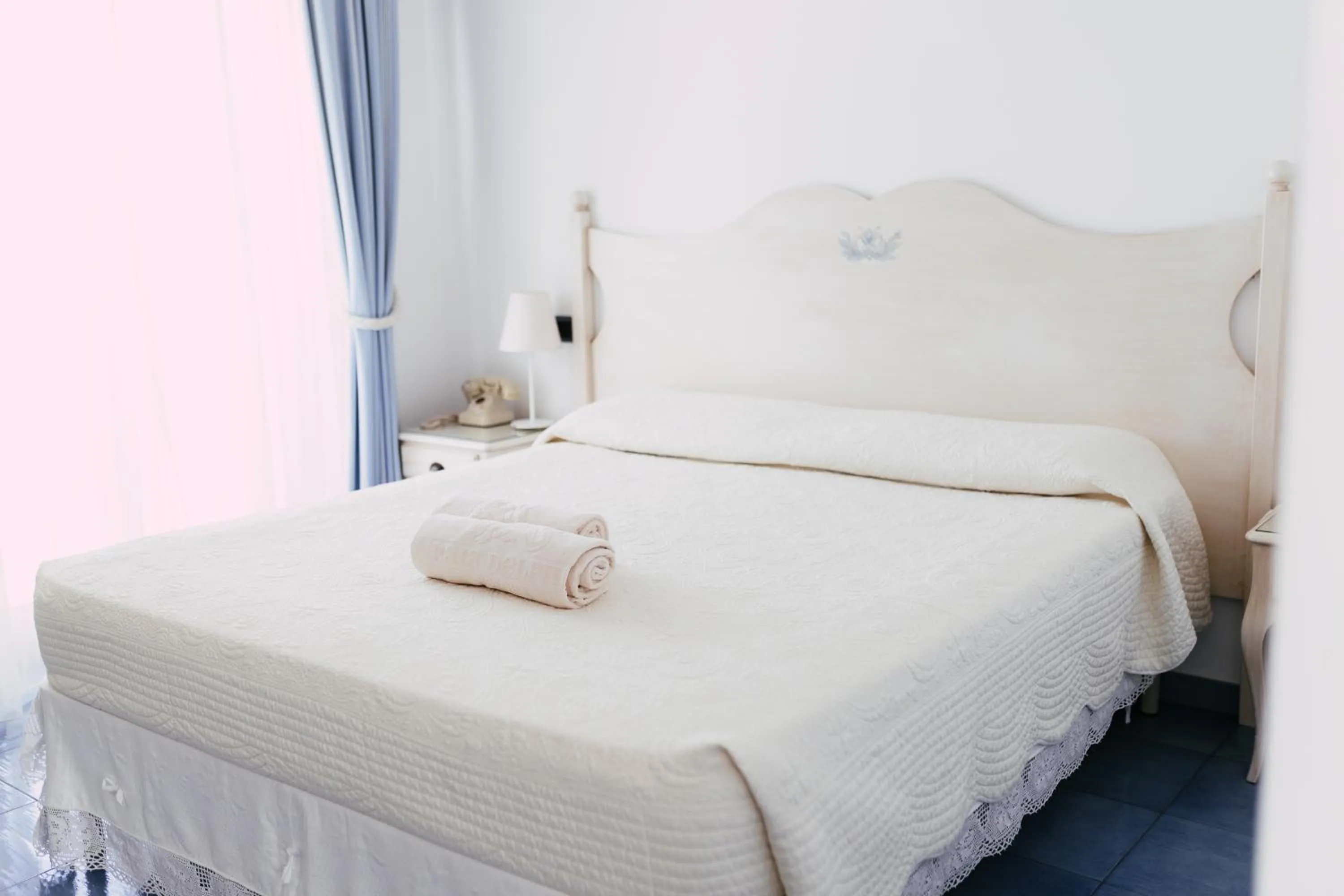 Bed in Baia Delphis Resort