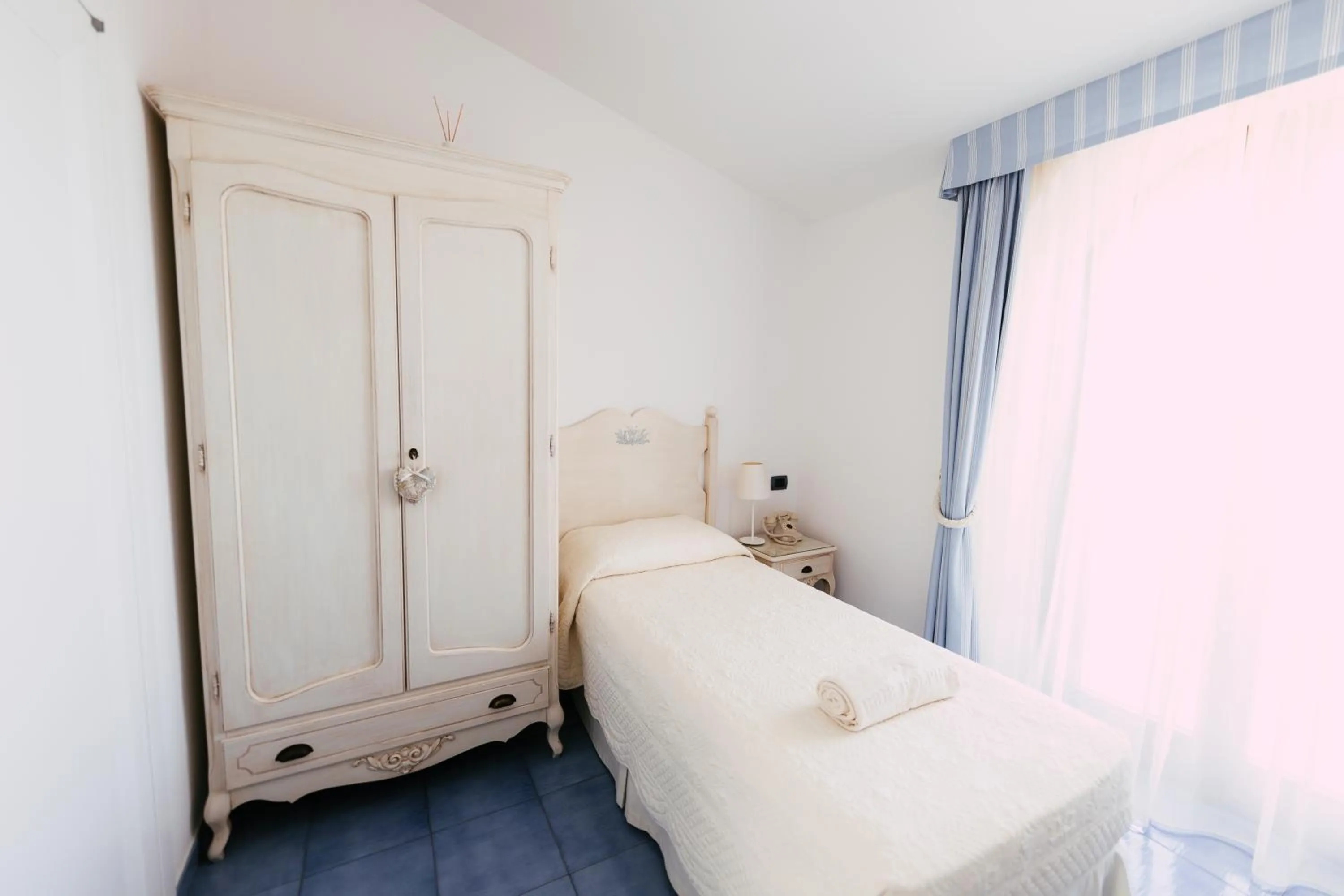 Bed in Baia Delphis Resort