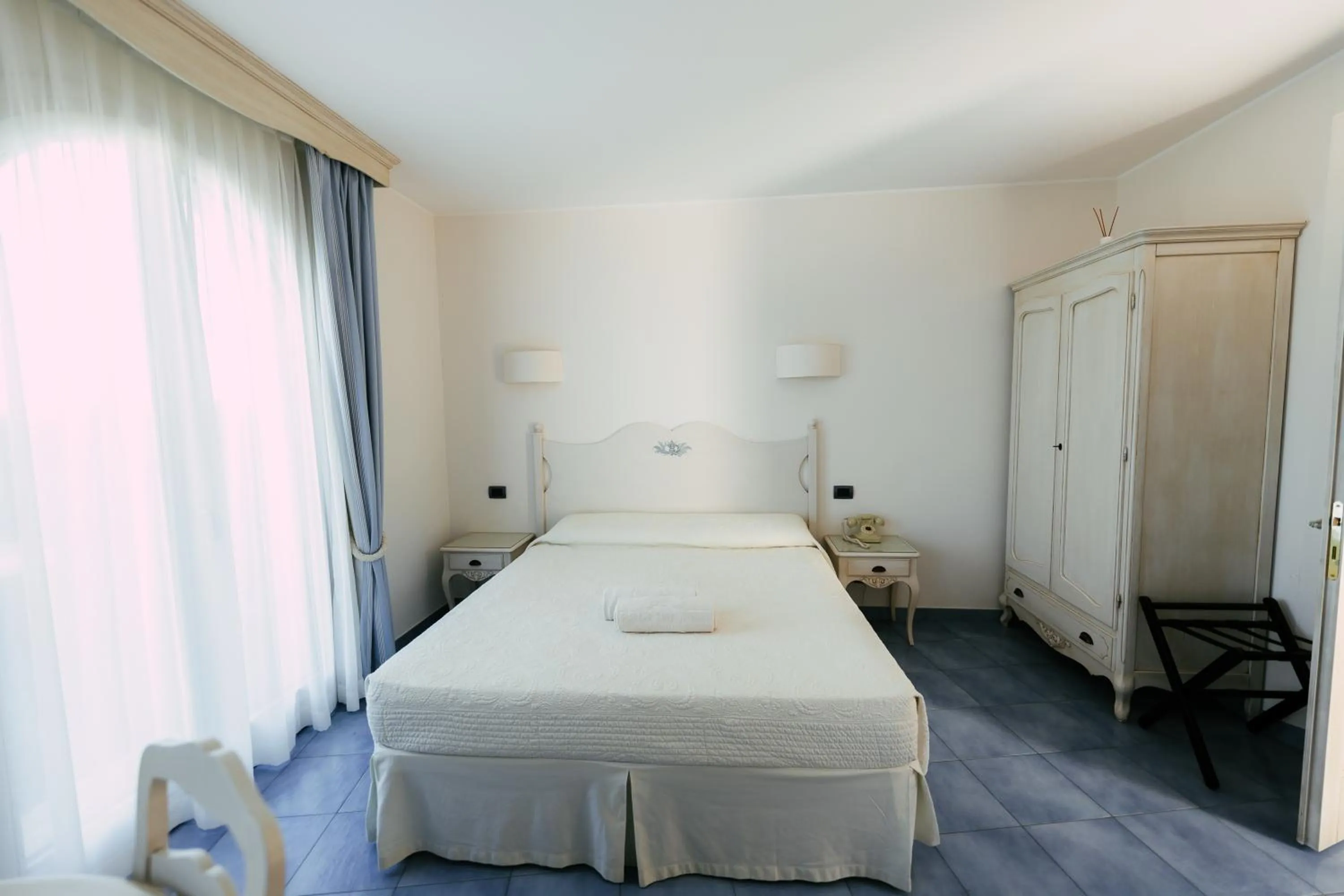 Bed in Baia Delphis Resort