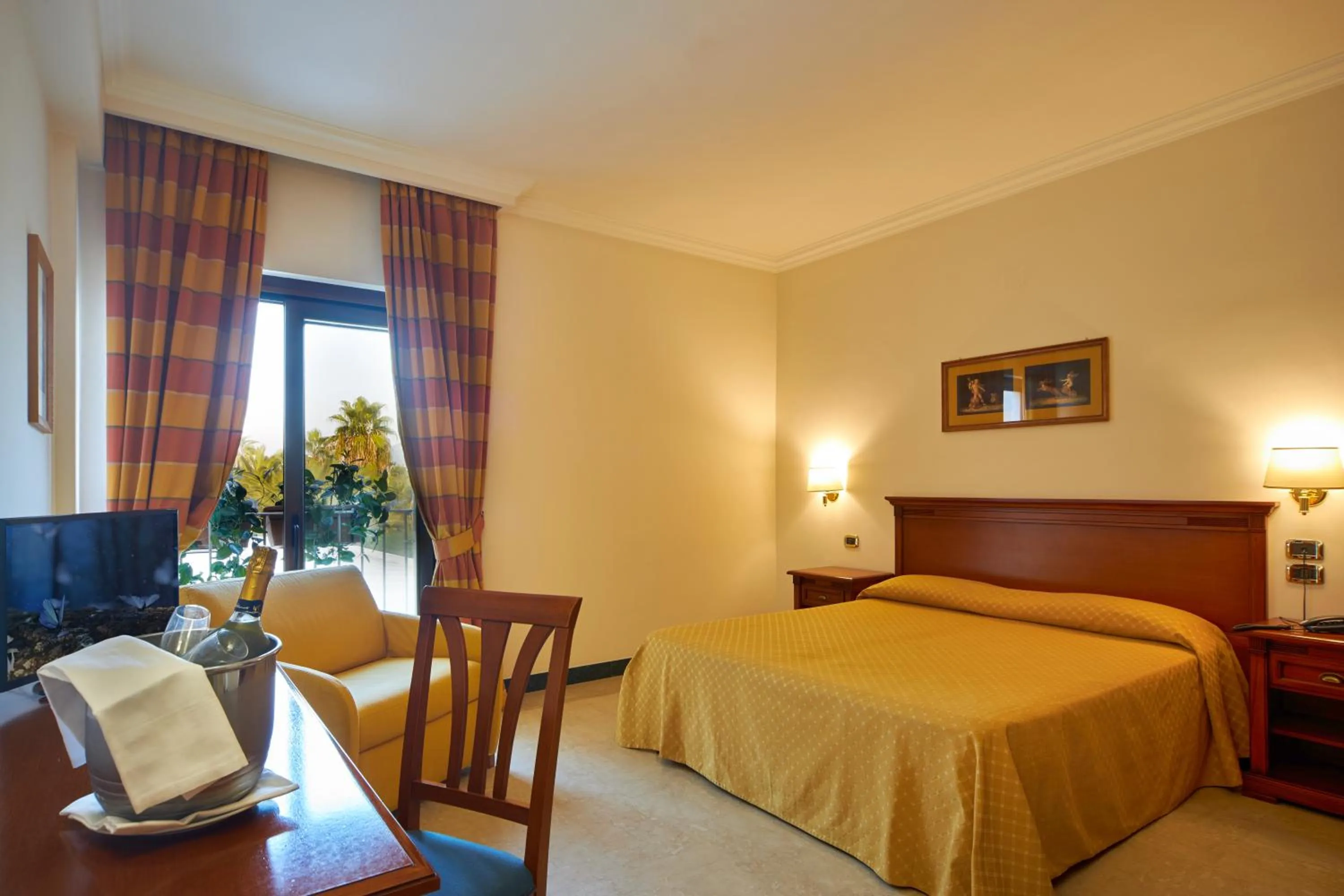 Bed in Minerva Resort Hotel