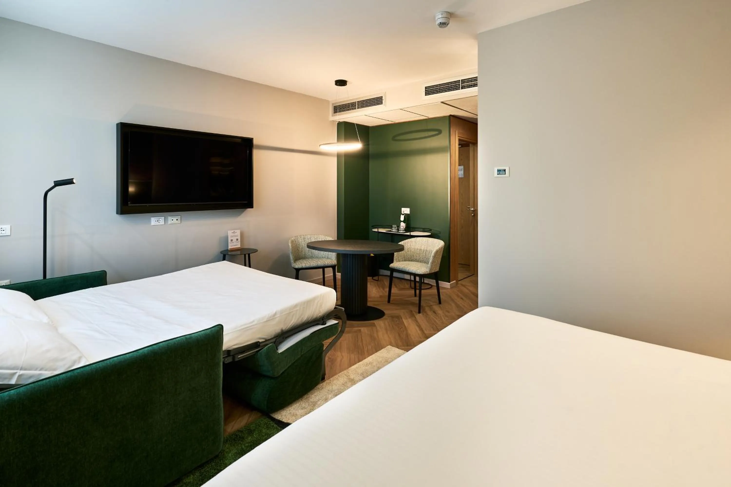 Bed in Crowne Plaza Padova by IHG