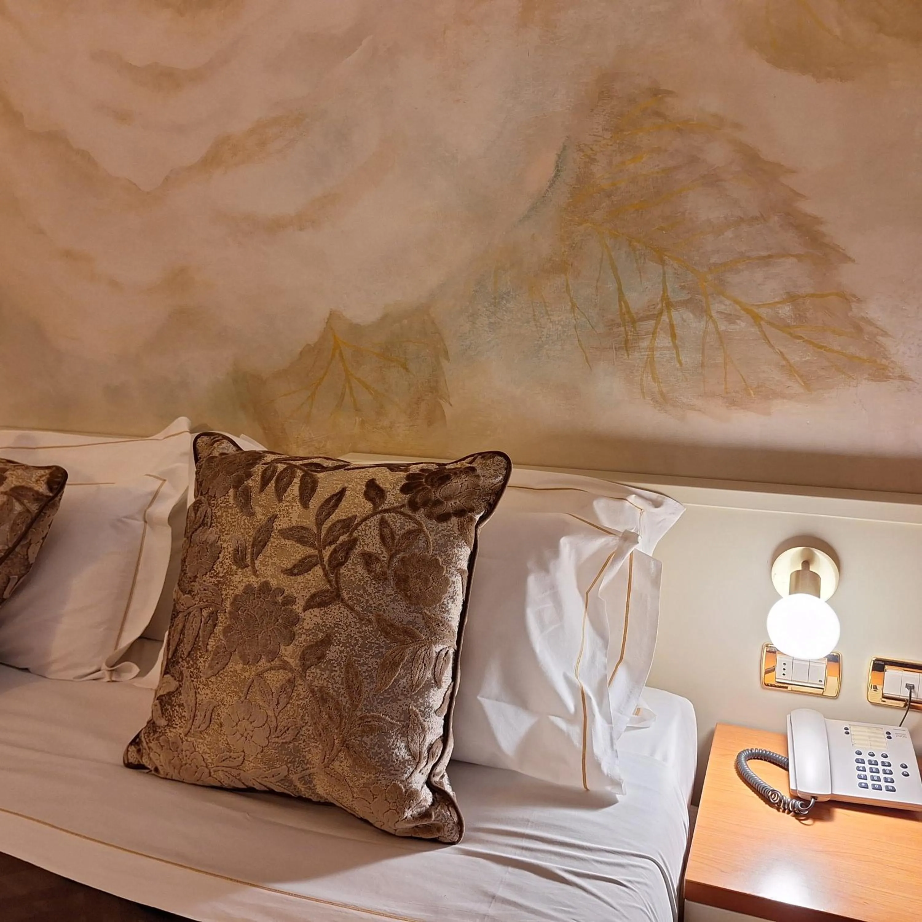 Bed in Hotel Maxim Axial