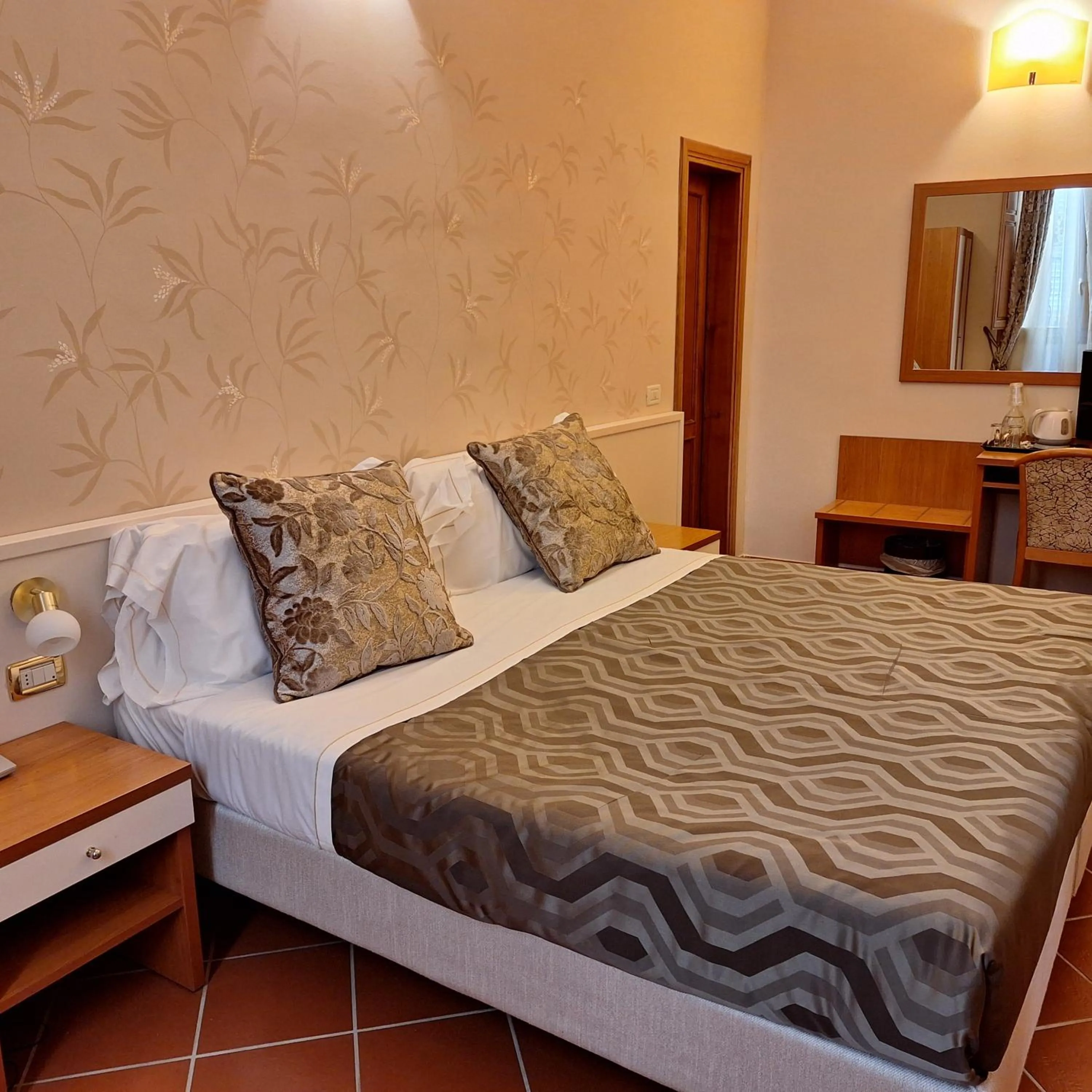 Bed in Hotel Maxim Axial