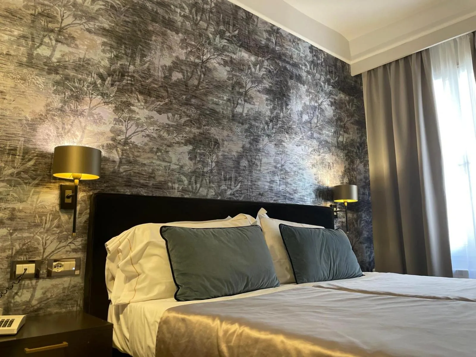 Bed in Hotel Maxim Axial