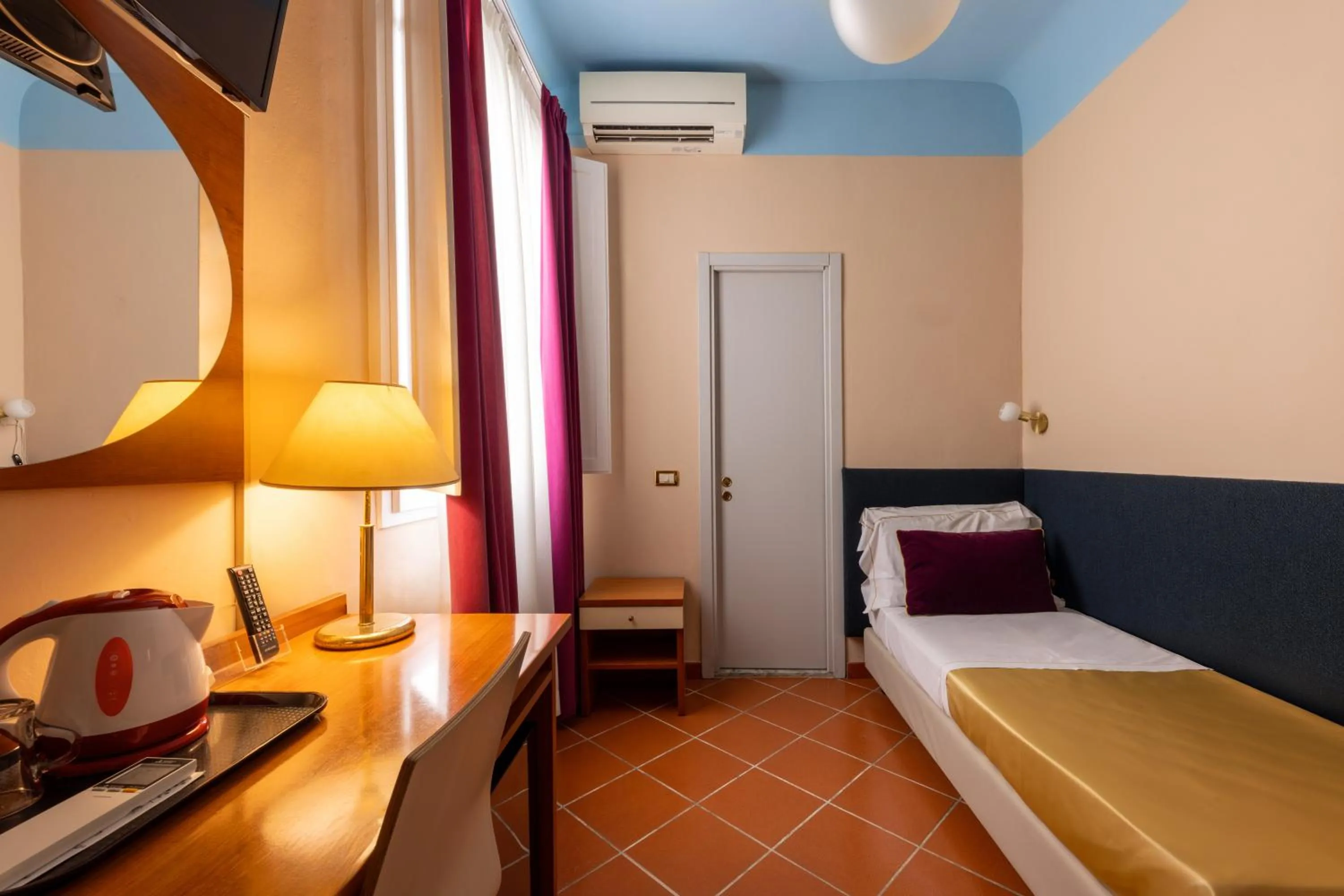 Bed in Hotel Maxim Axial